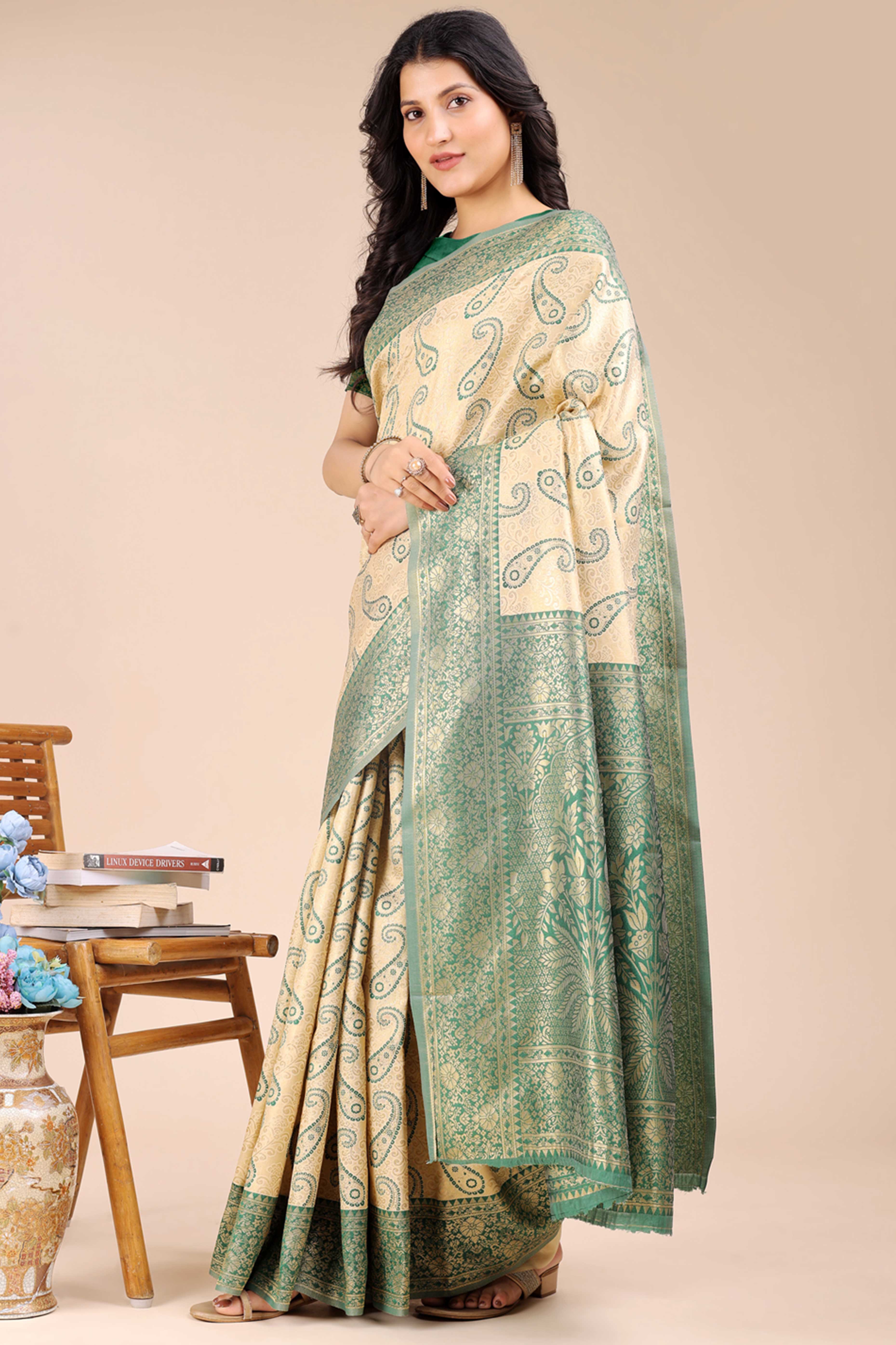 Cream Banarasi Silk Saree Featuring Green Floral Zari Weaving and a Rich Contrast Border