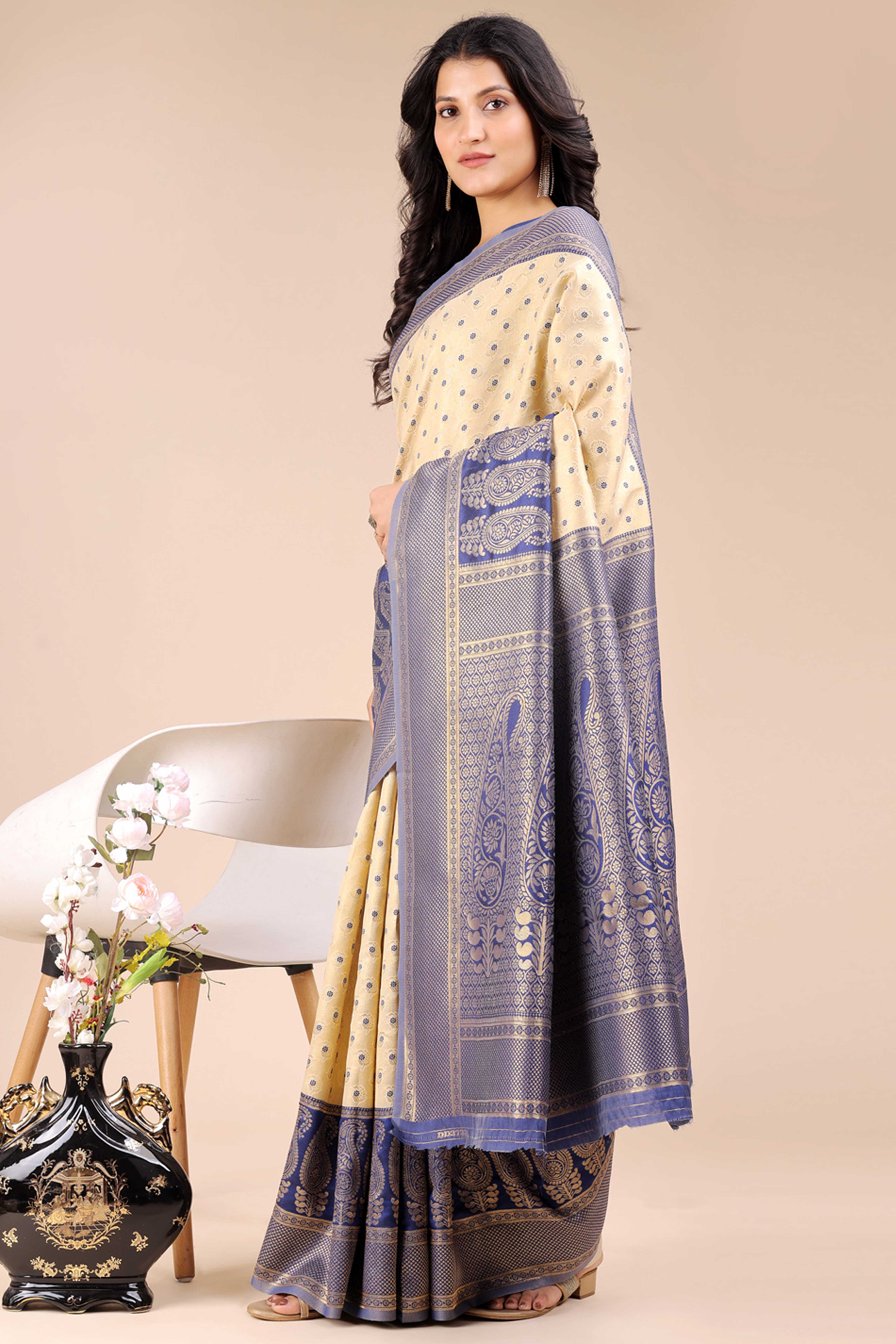 Cream Banarasi Silk Saree Featuring Lustrous Navy Blue Floral Zari Weaving and a Rich Contrast Border