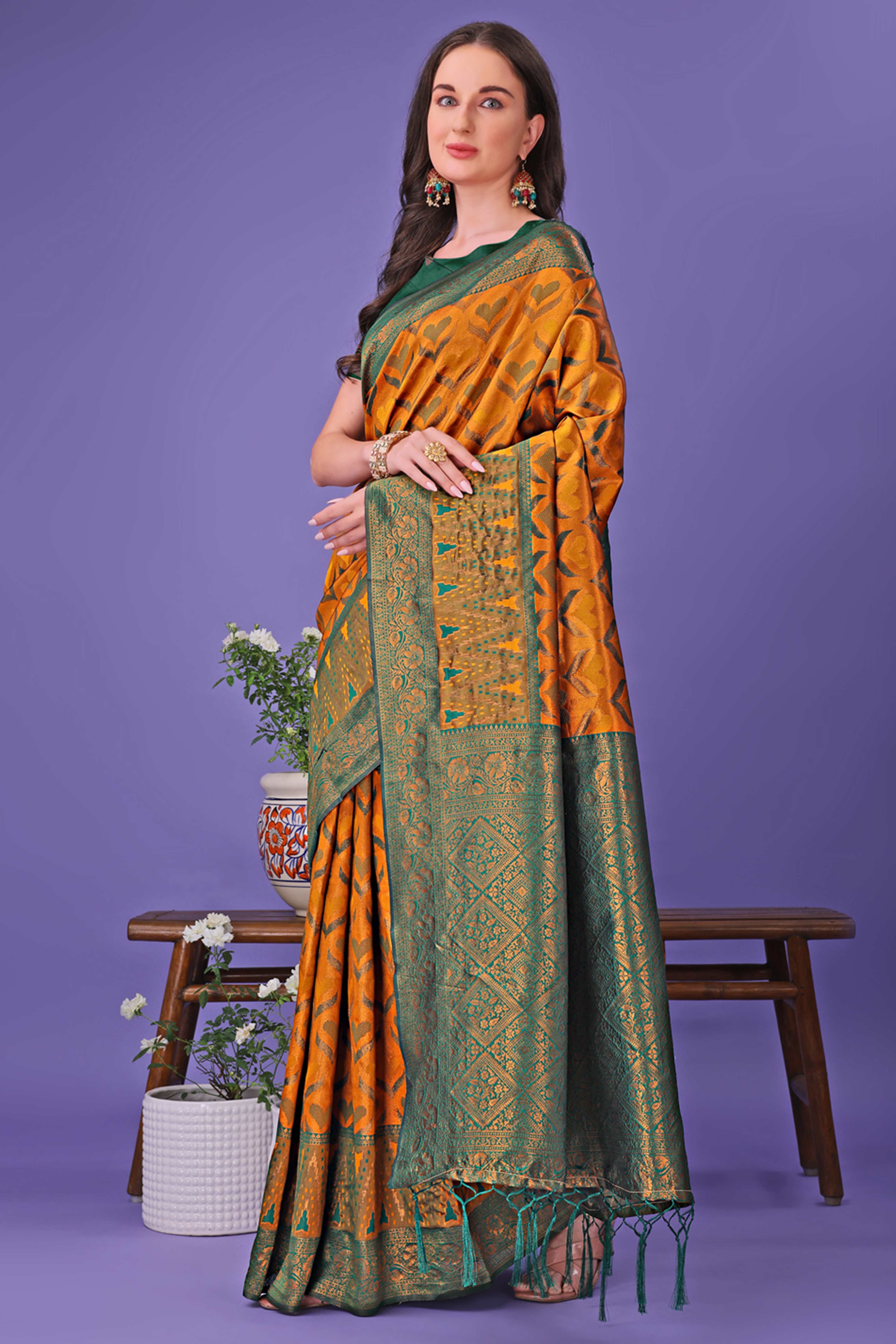 Mustard Heart Motif Zari Woven Lichi Cotton Silk Saree With Flowing Tassels