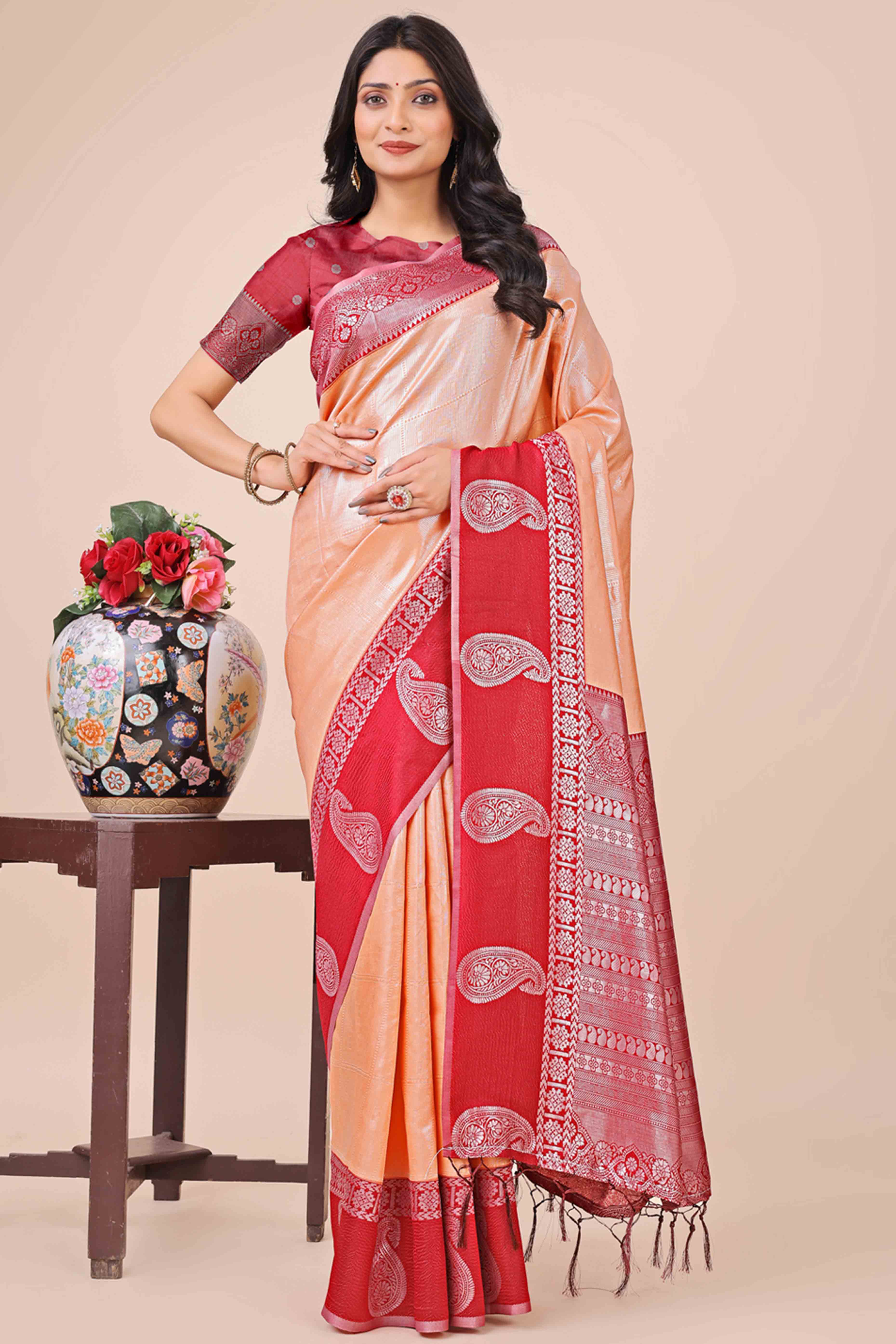 Peach Lichi Silk Blend Saree With Intricate Paisley Zari Weave & Graceful Tassels