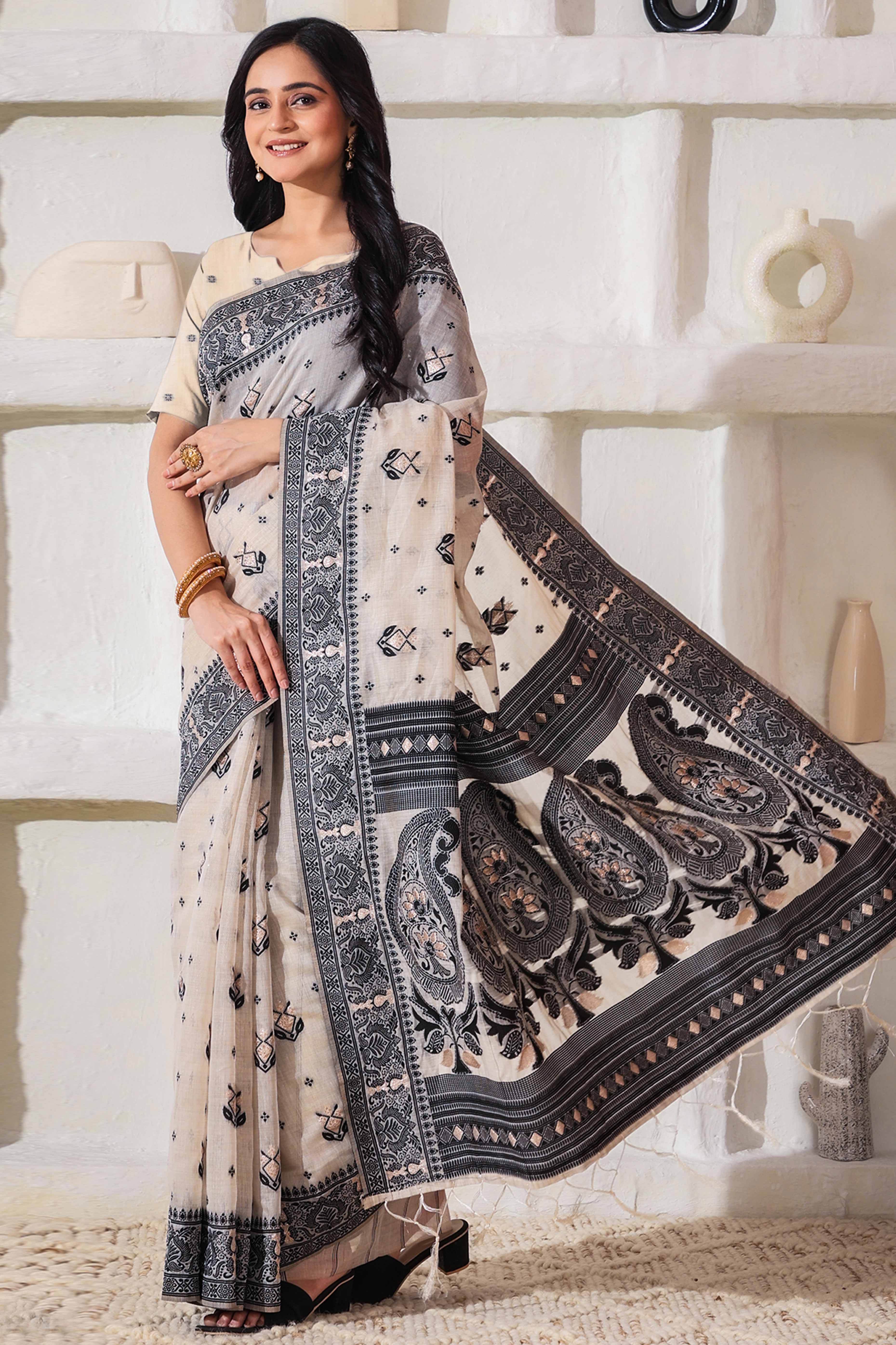 Classic Cream & Black Linen Cotton Saree Featuring Intricate Zari Weaving & Tassel Pallu