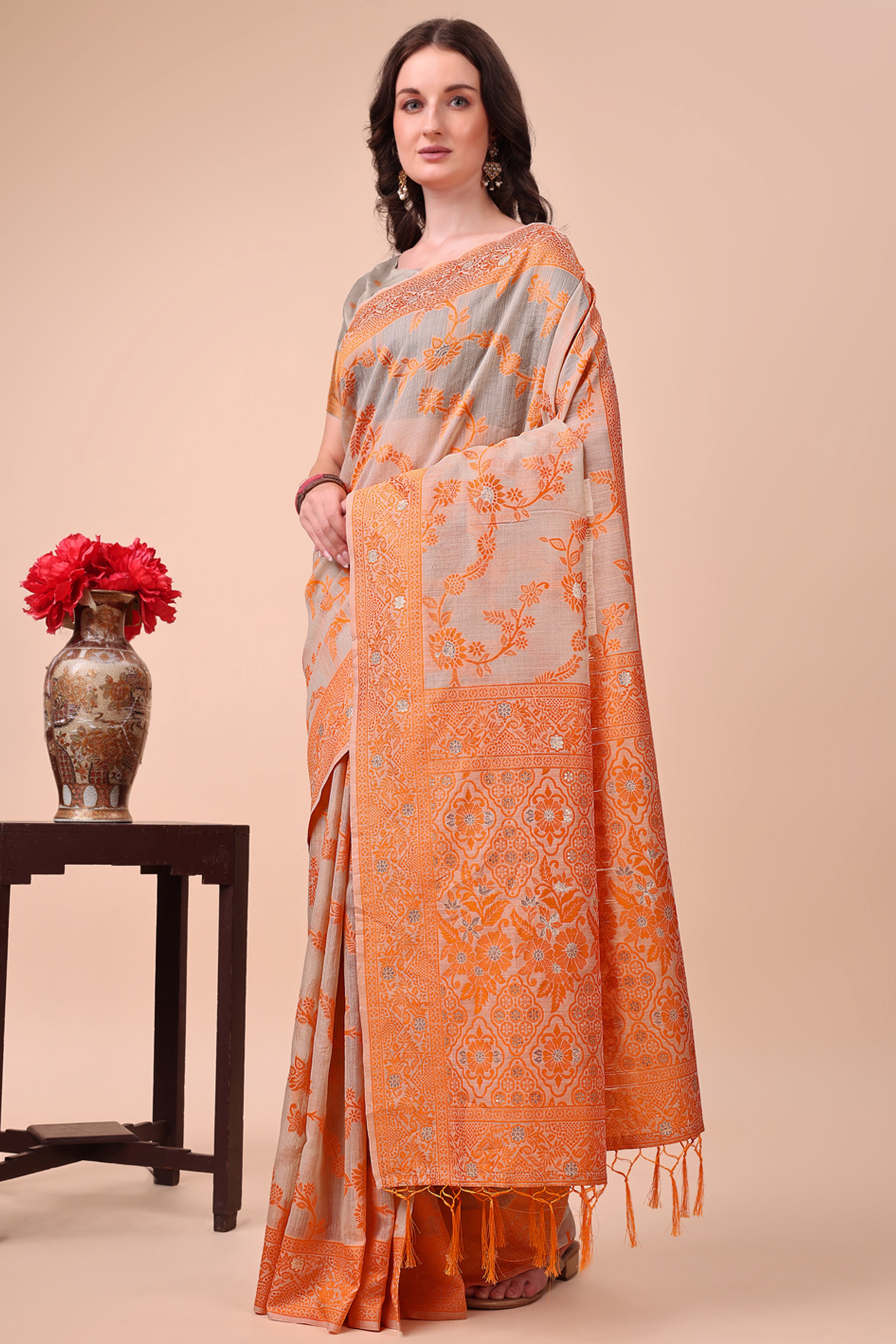 Orange Floral Zari Woven Cotton Blend Saree With Delicate Tassel Detailing