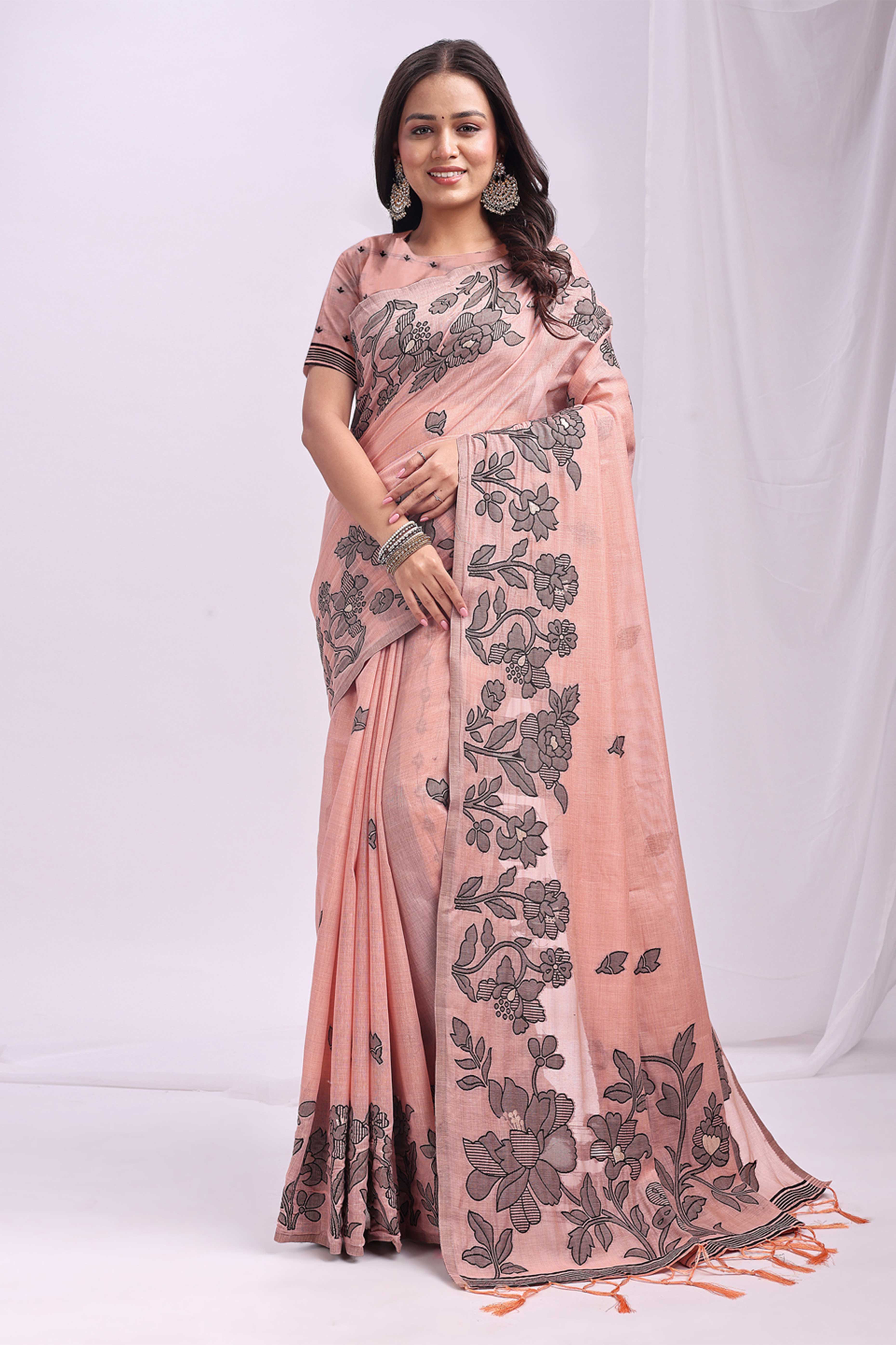 Peach Ethnic Saree in a Linen Cotton Blend Adorned with Floral Weave Designs