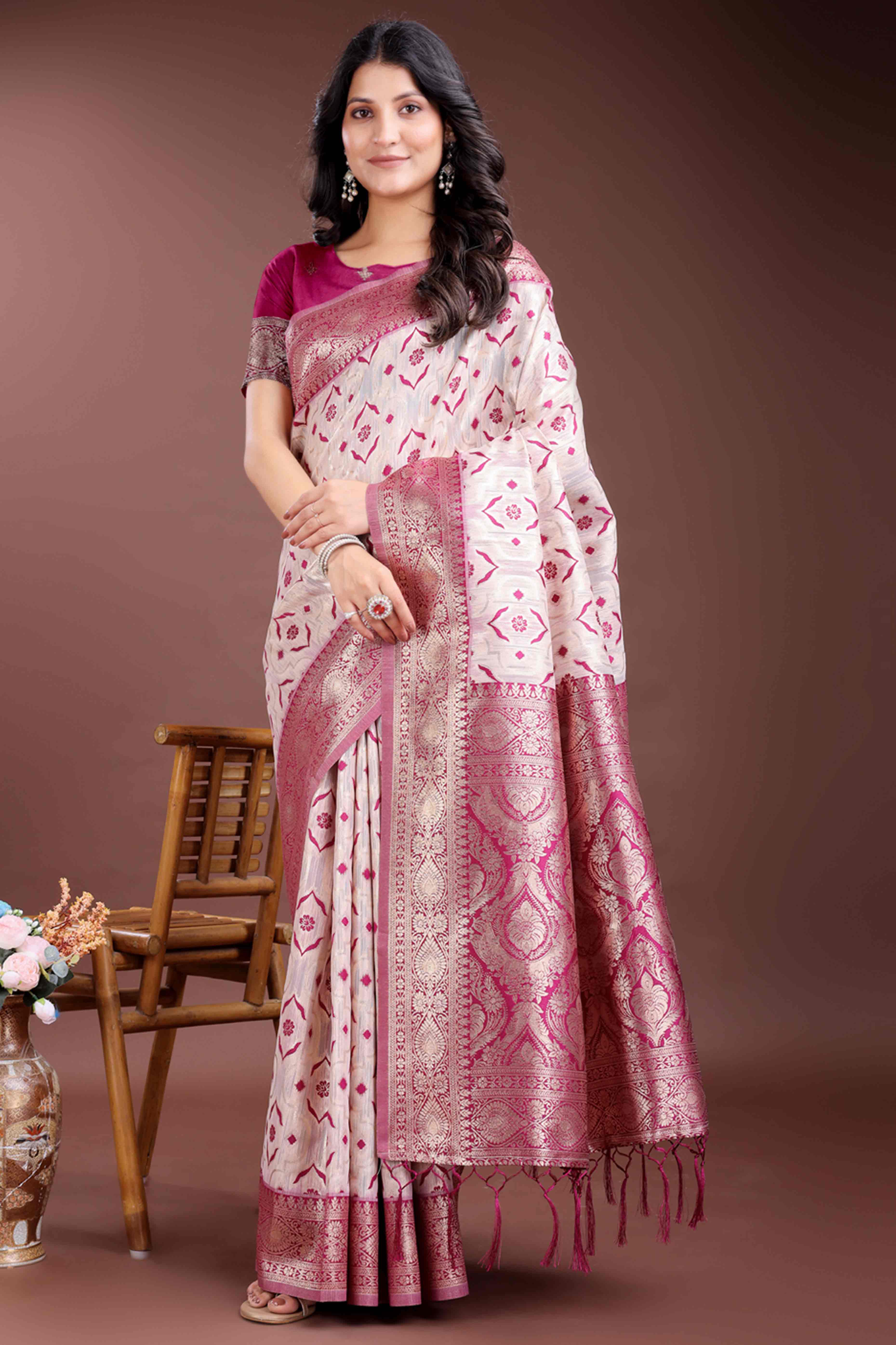 Vibrant Magenta Traditional Ikkat Style Zari Weaving Cotton Blend Saree with Bold Tassel Accents