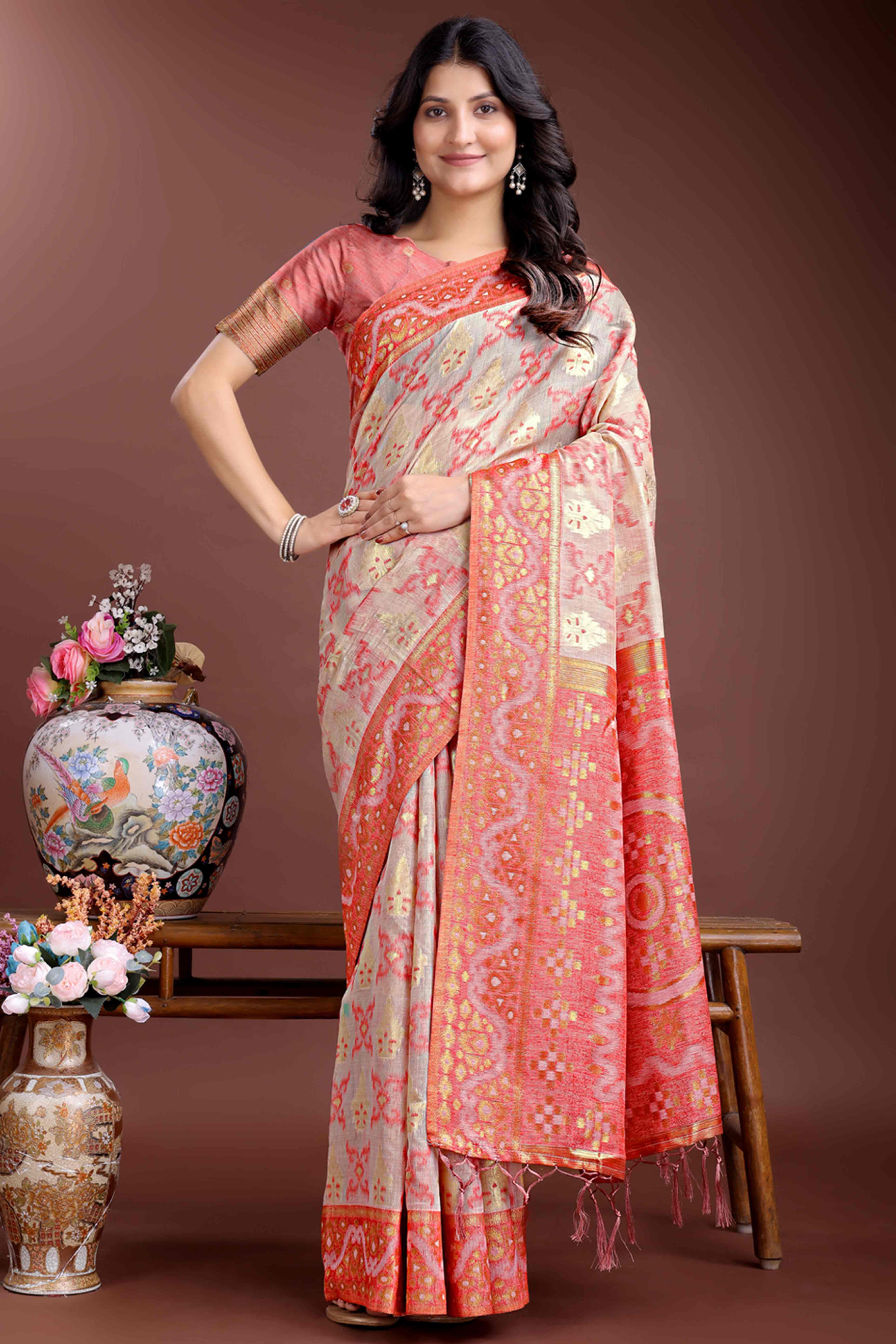 Exquisite Peach Traditional Ikkat Style Zari Weaving Cotton Blend Saree with Delicate Tassels