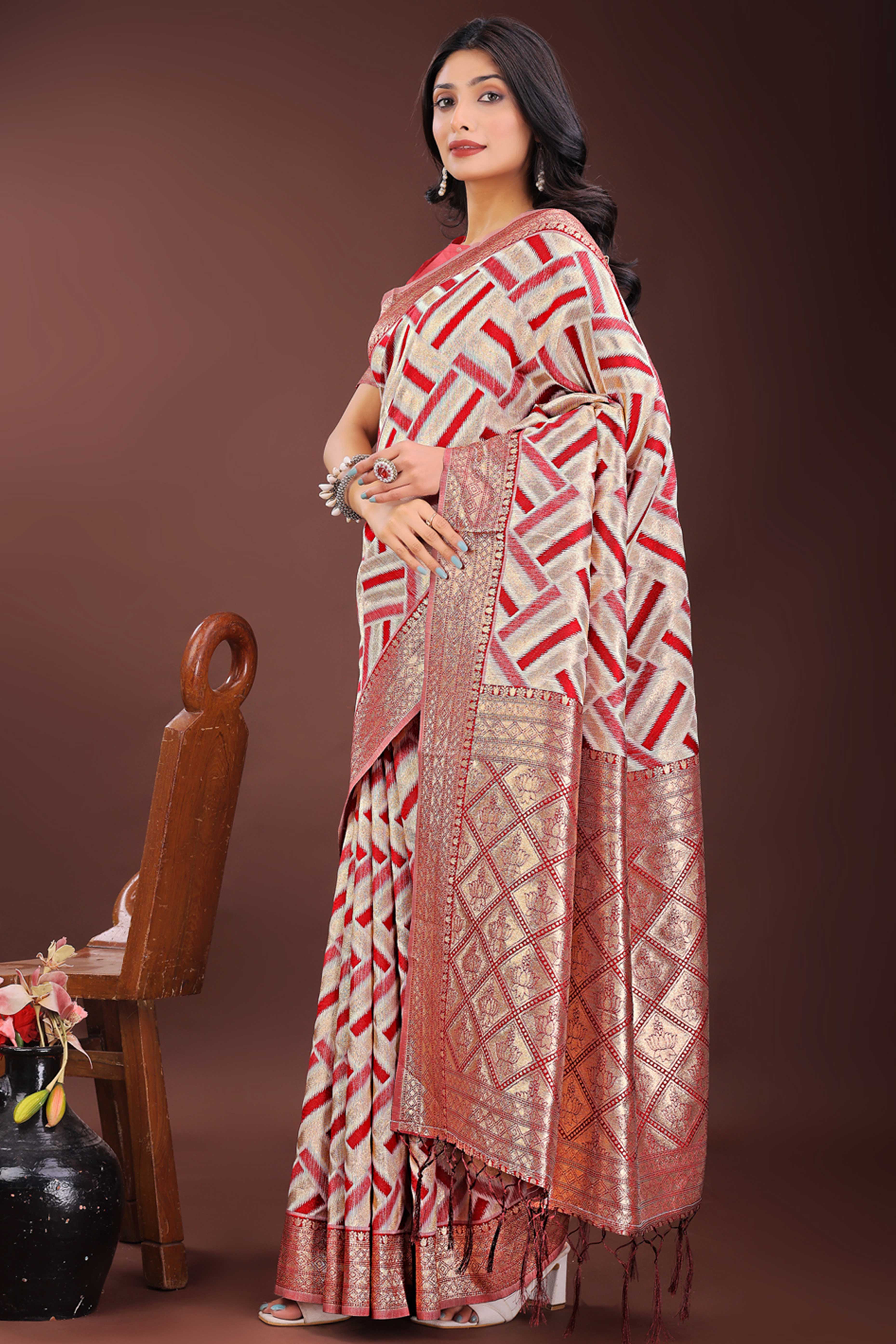 Red Saree with Zari Woven Geometric Motifs and Graceful Tassel Accents
