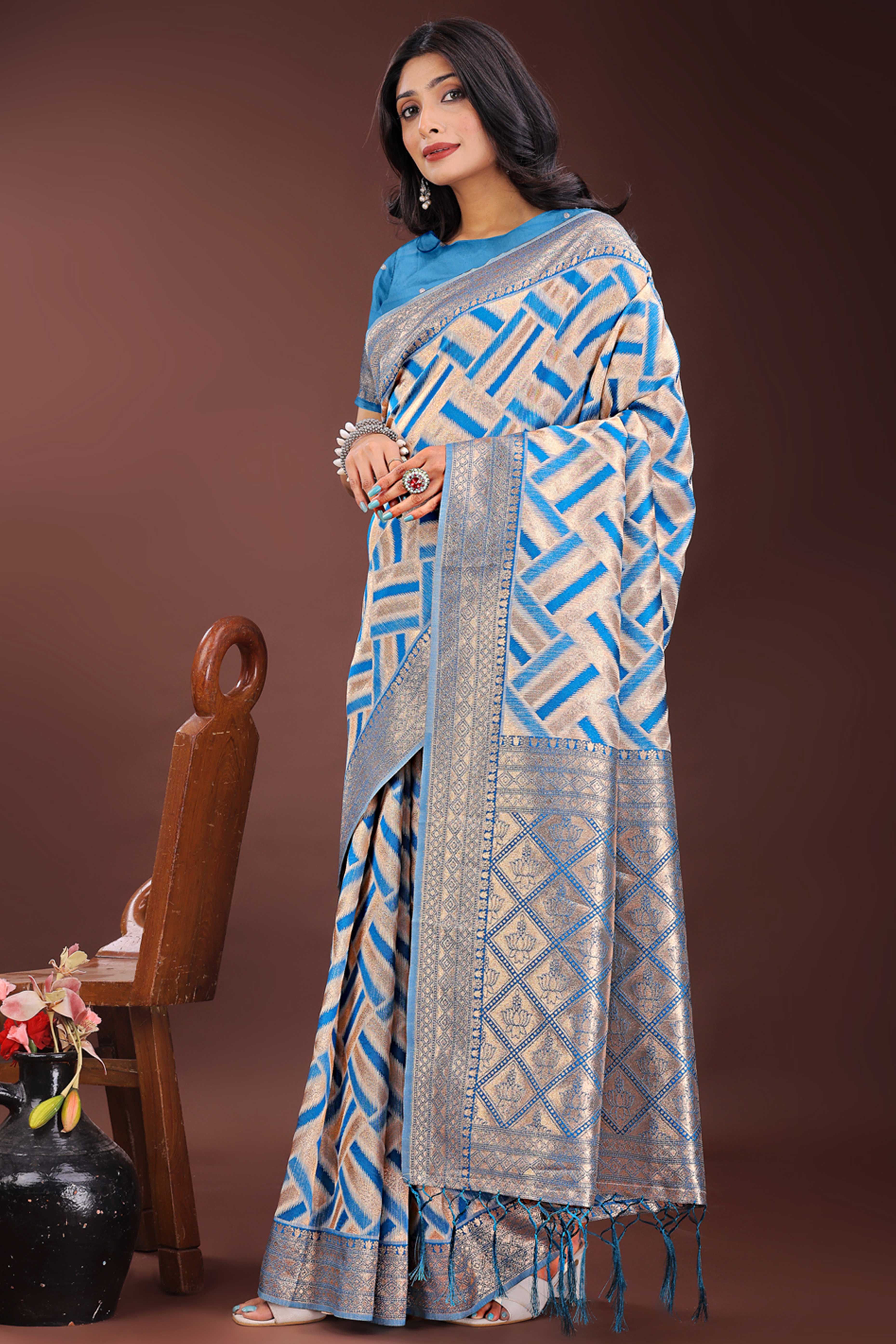 Blue Saree with Zari Woven Geometric Motifs and Graceful Tassel Accents