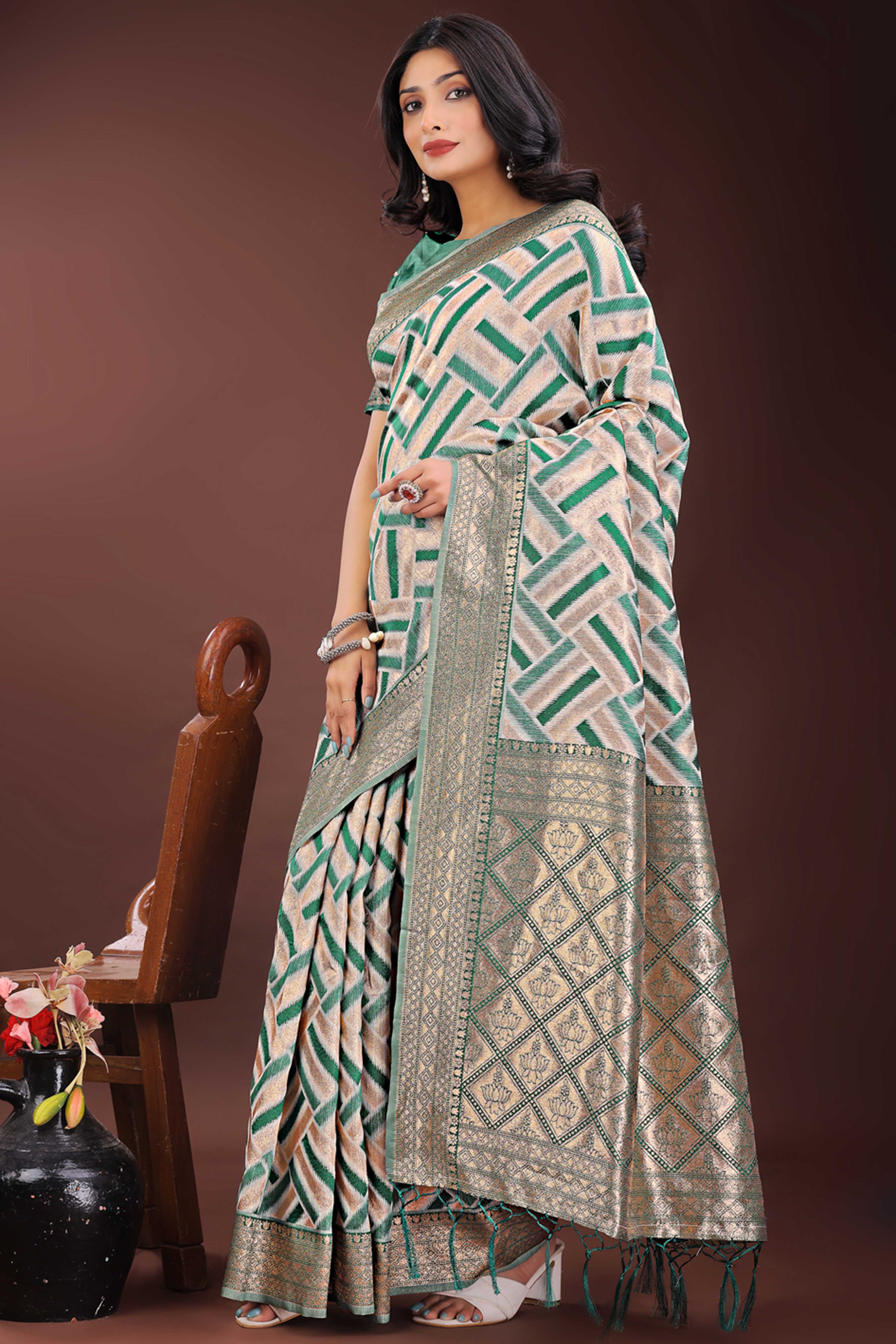 Green Saree with Zari Woven Geometric Motifs and Graceful Tassel Accents