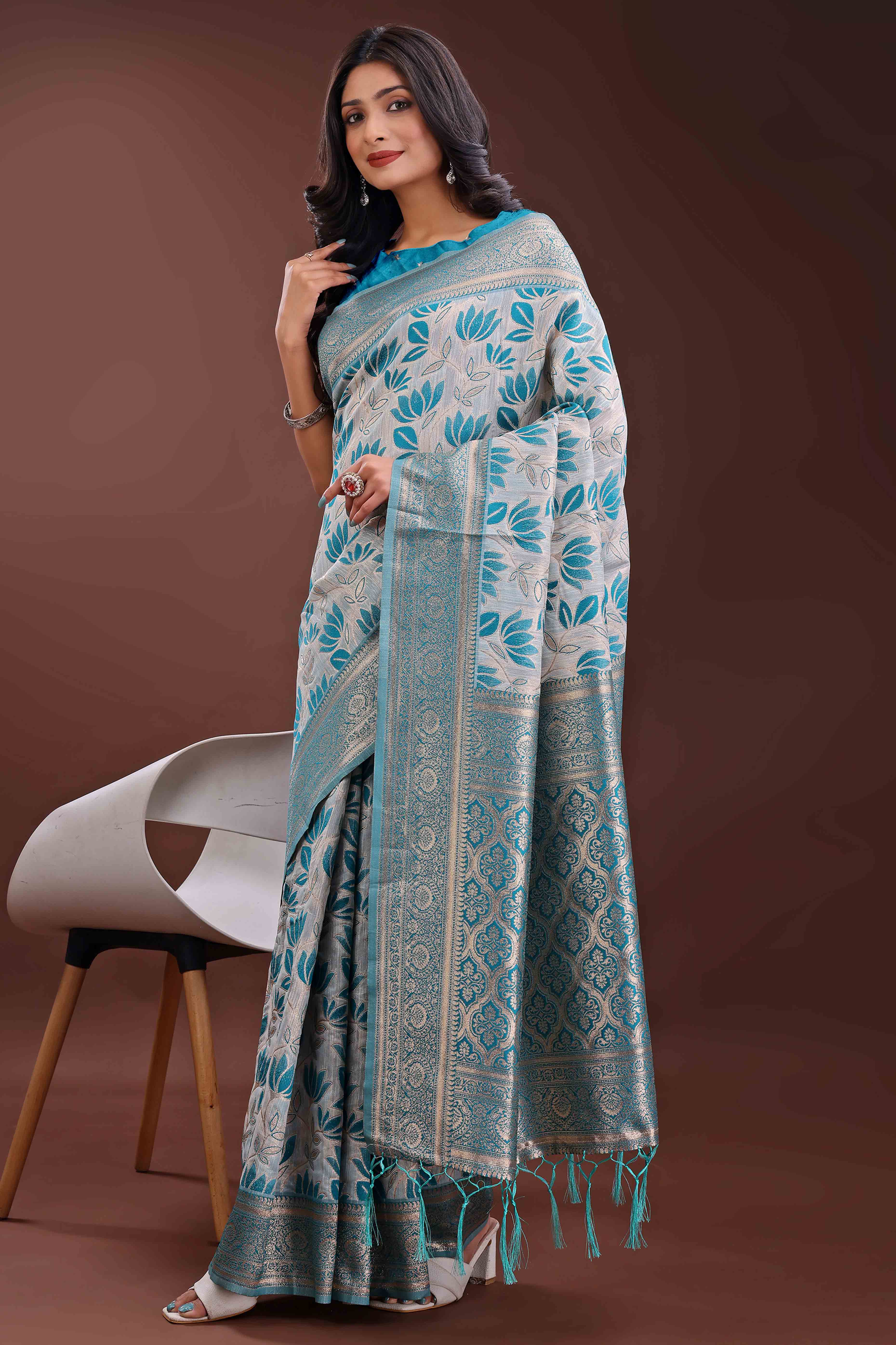 Sky Blue Linen Cotton Saree Featuring Graceful Floral Patterns in Zari Weave