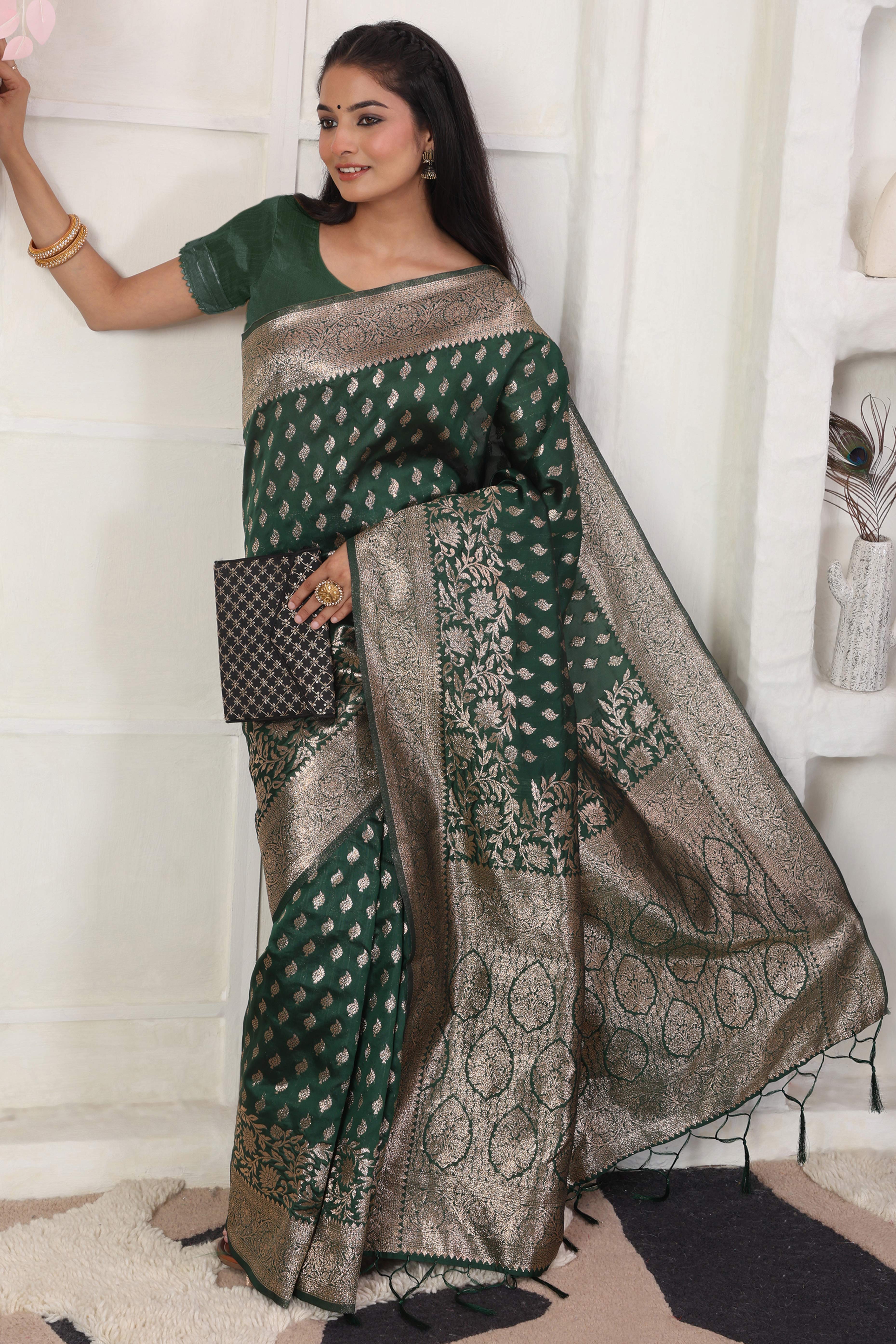 Green Traditional Lichi Silk Blend Saree Enhanced With Floral Zari Weaving & Tassel Pallu
