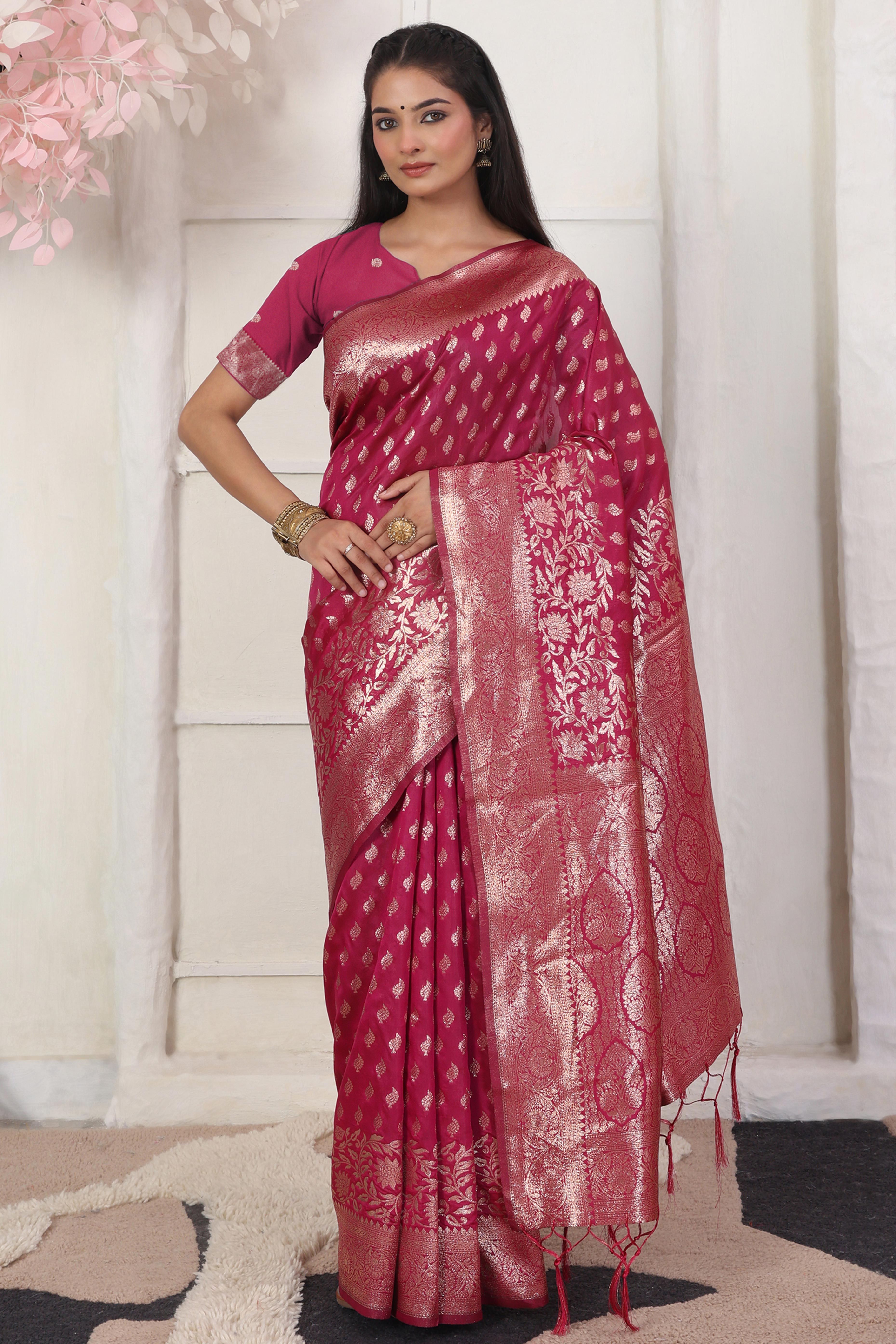 Pink Traditional Lichi Silk Blend Saree Enhanced With Floral Zari Weaving & Tassel Pallu