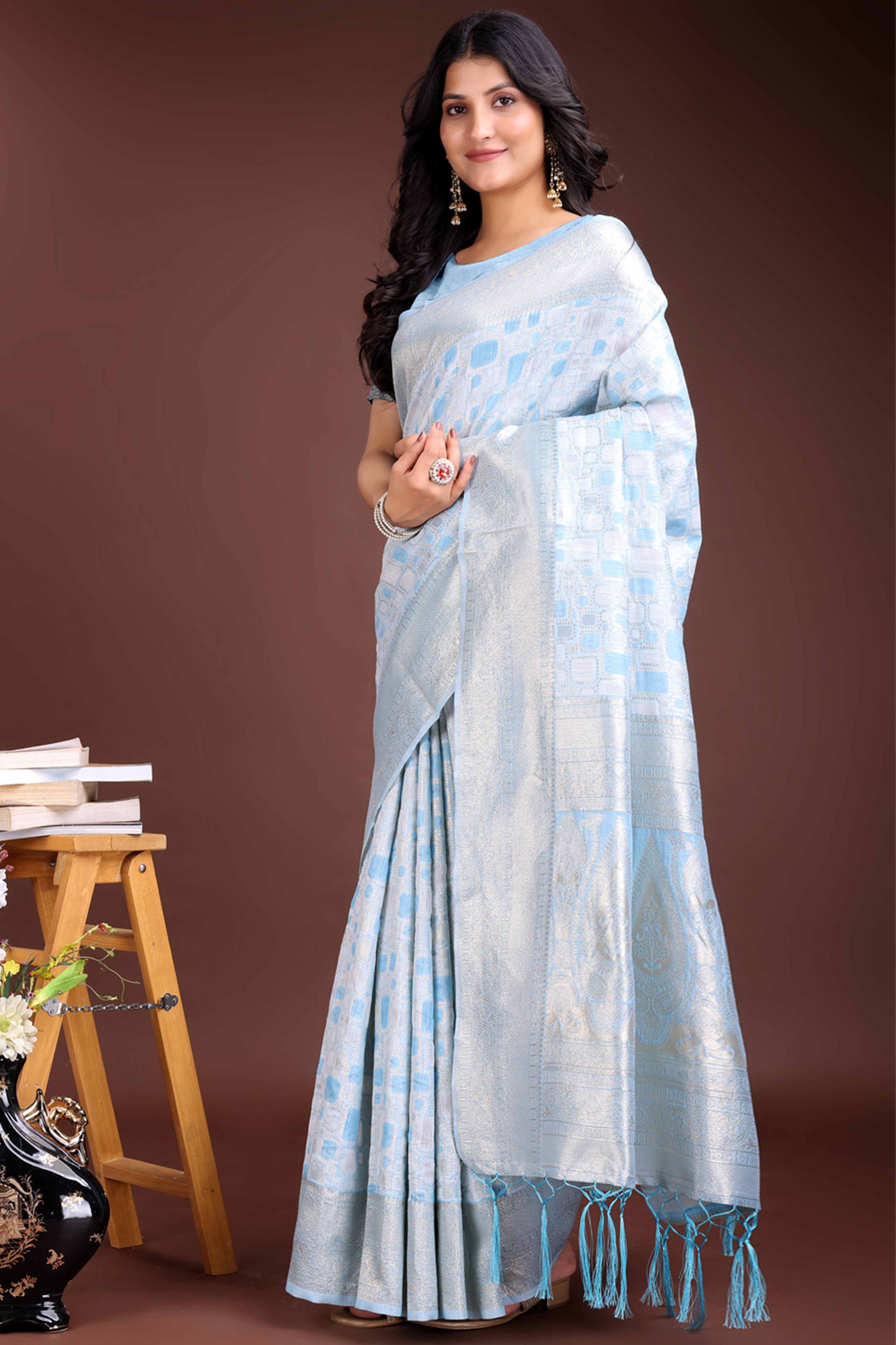 Breathtaking Sky Blue Geometric Style Zari Weaving Cotton Blend Saree Enhanced with Elegant Tassels