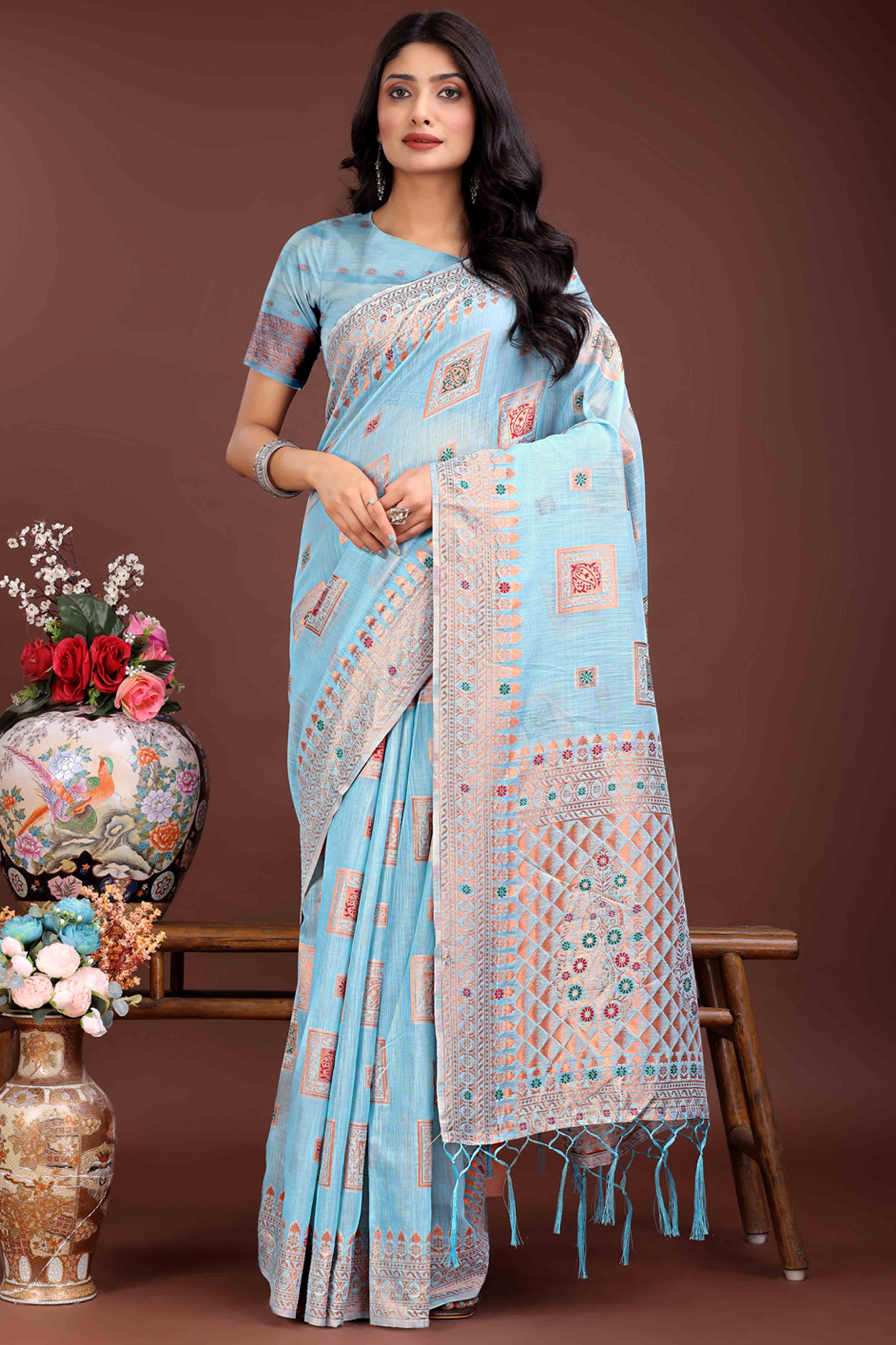 Elegant Floral Zari Weaving Embellished Sky Blue Saree In Linen Cotton with Tassel Accents