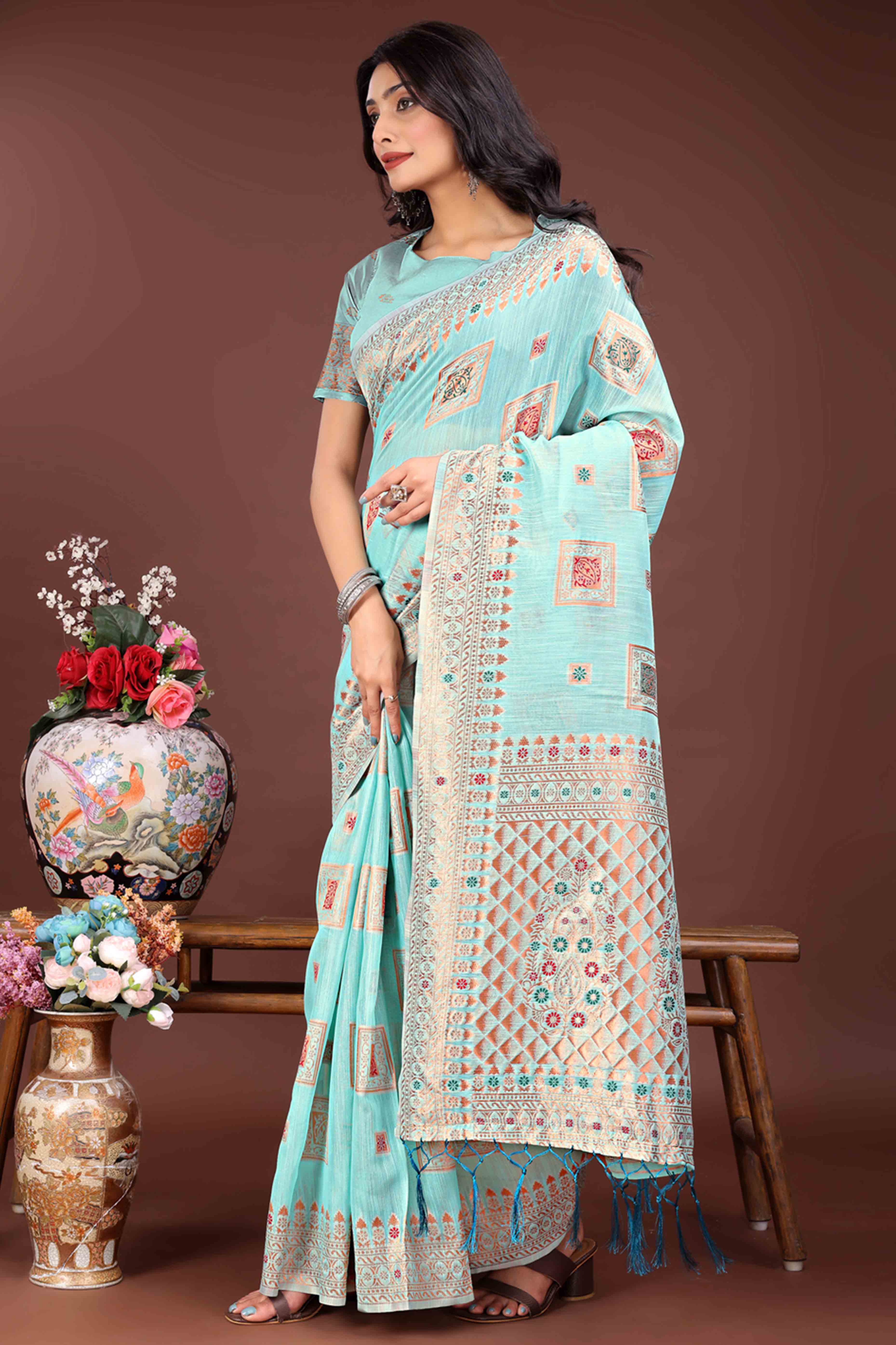 Majestic Floral Zari Weaving Embellished Pale Blue Saree In Linen Cotton with Tassel Accents