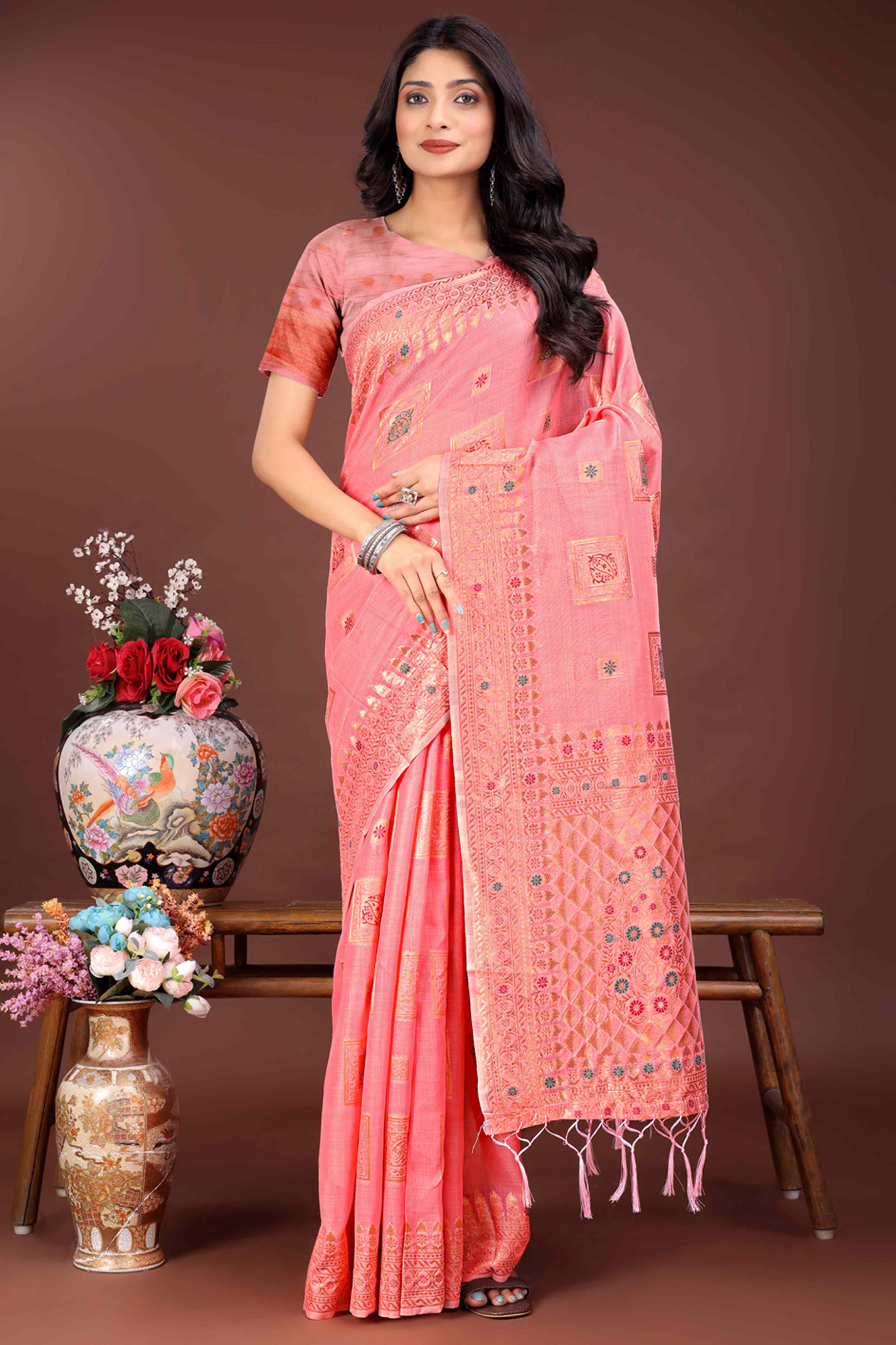 Refreshing Floral Zari Weaving Embellished Gajari Pink Saree In Linen Cotton with Tassel Accents