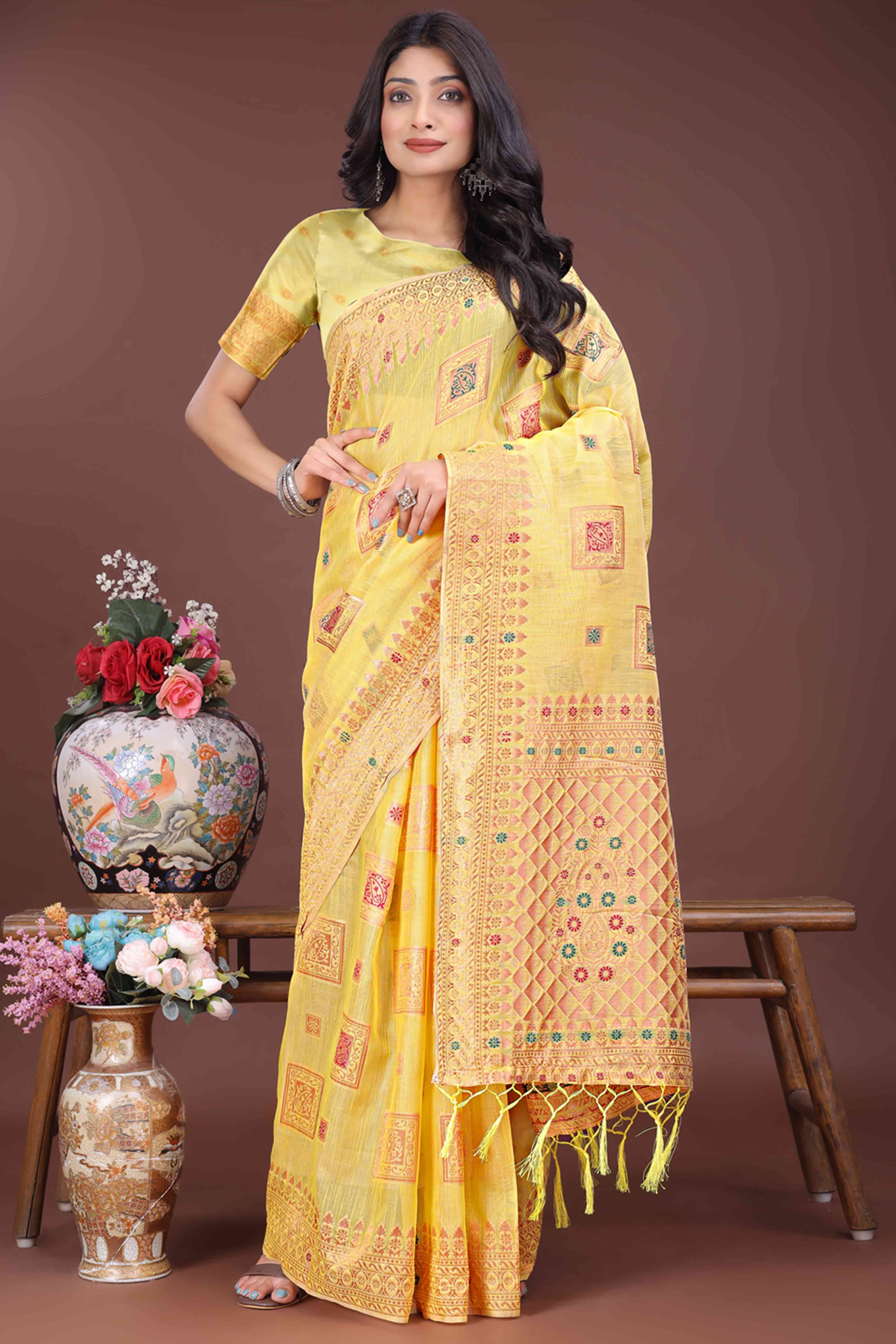 Dazzling Floral Zari Weaving Embellished Yellow Saree In Linen Cotton with Tassel Accents