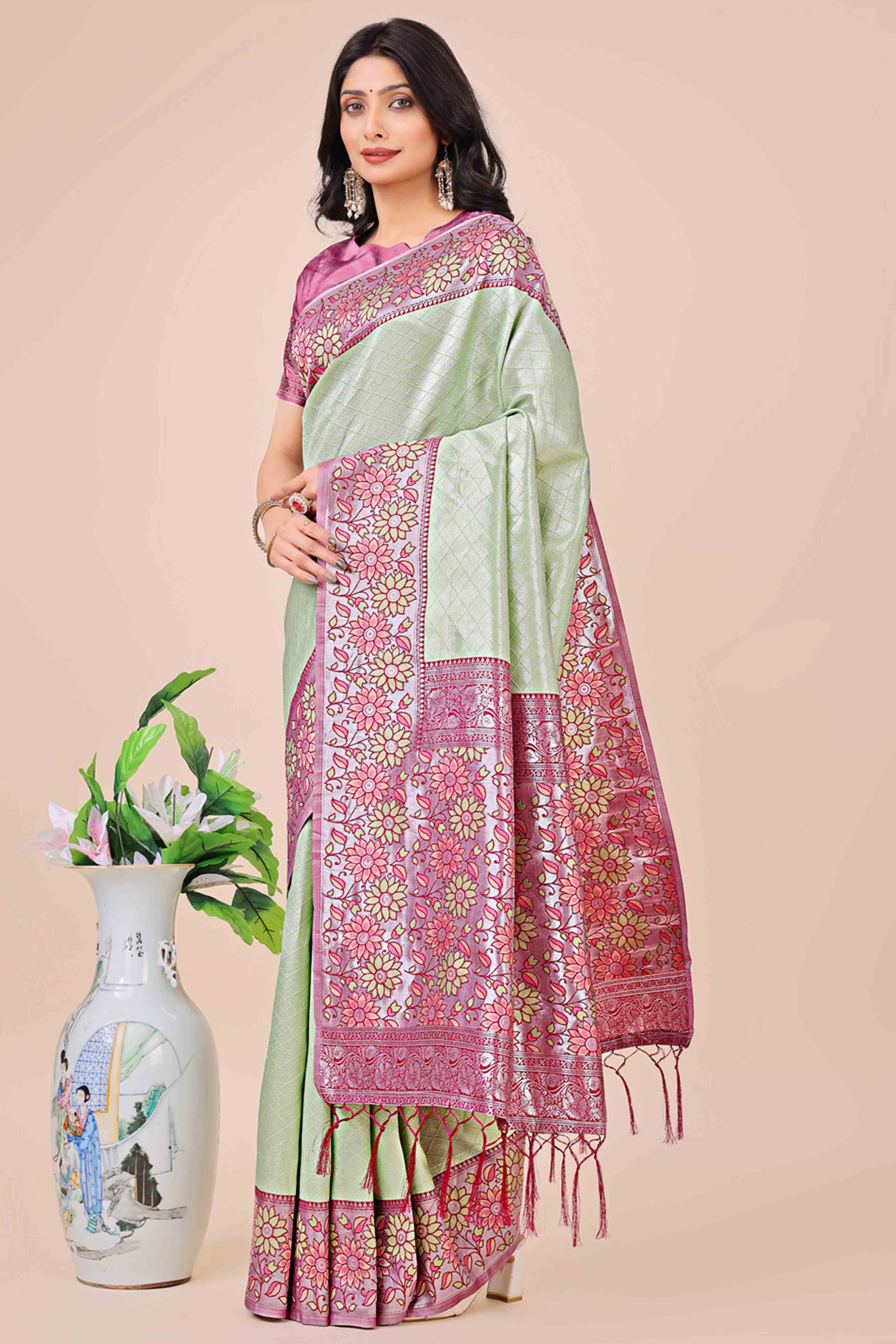 Green Lichi Silk Blend Saree With Exquisite Floral Weaving & Graceful Tassel Details