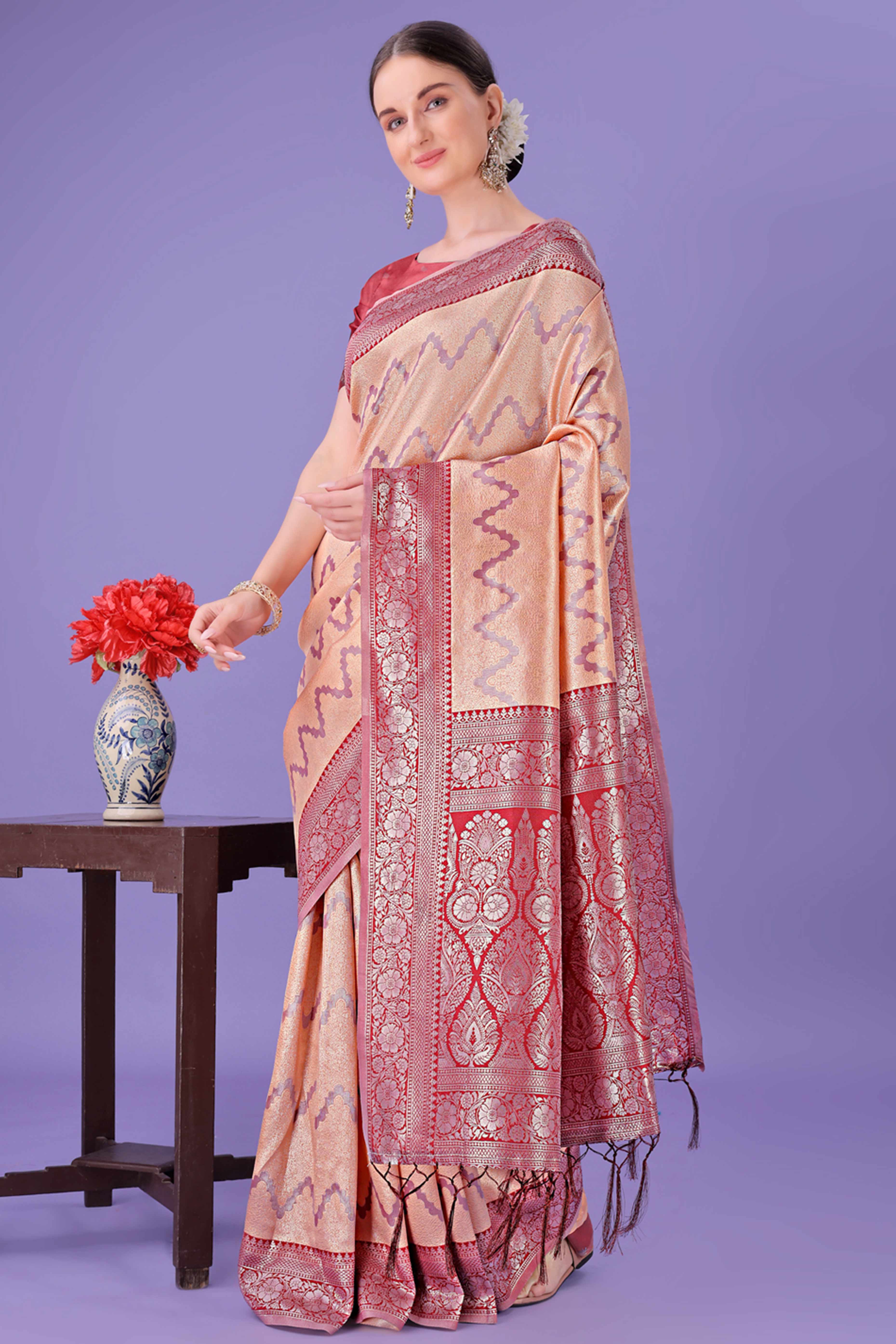 Peach Lichi Cotton Silk Saree Adorned With Floral Zari Weave & Tassels