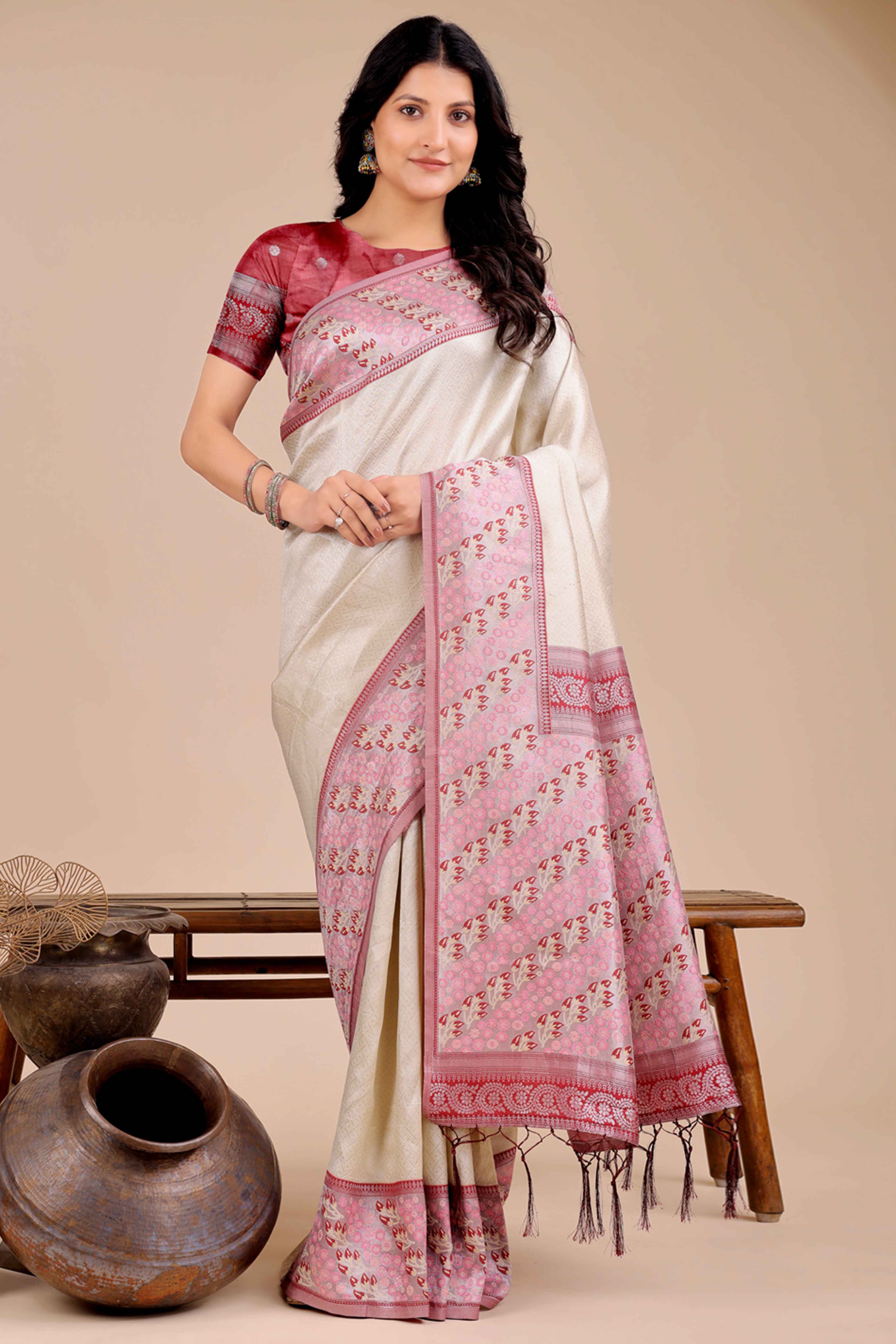 Cream Silk Blend Saree Embellished With Zari Weaving & Tassel Accents
