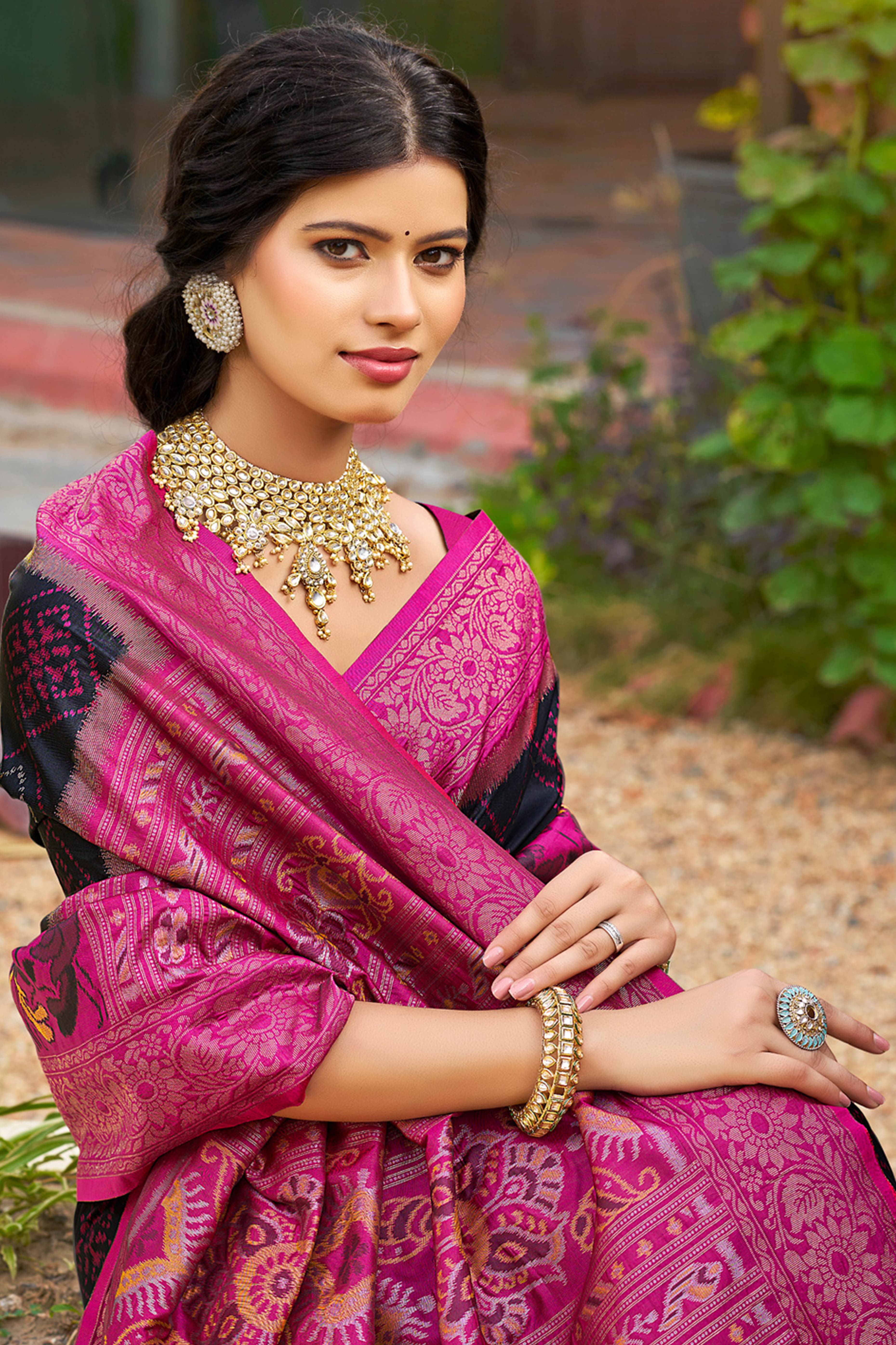 Graceful Black Pochampally Silk Blend Saree Adorned With Floral Weaving & Stylish Tassel Pallu