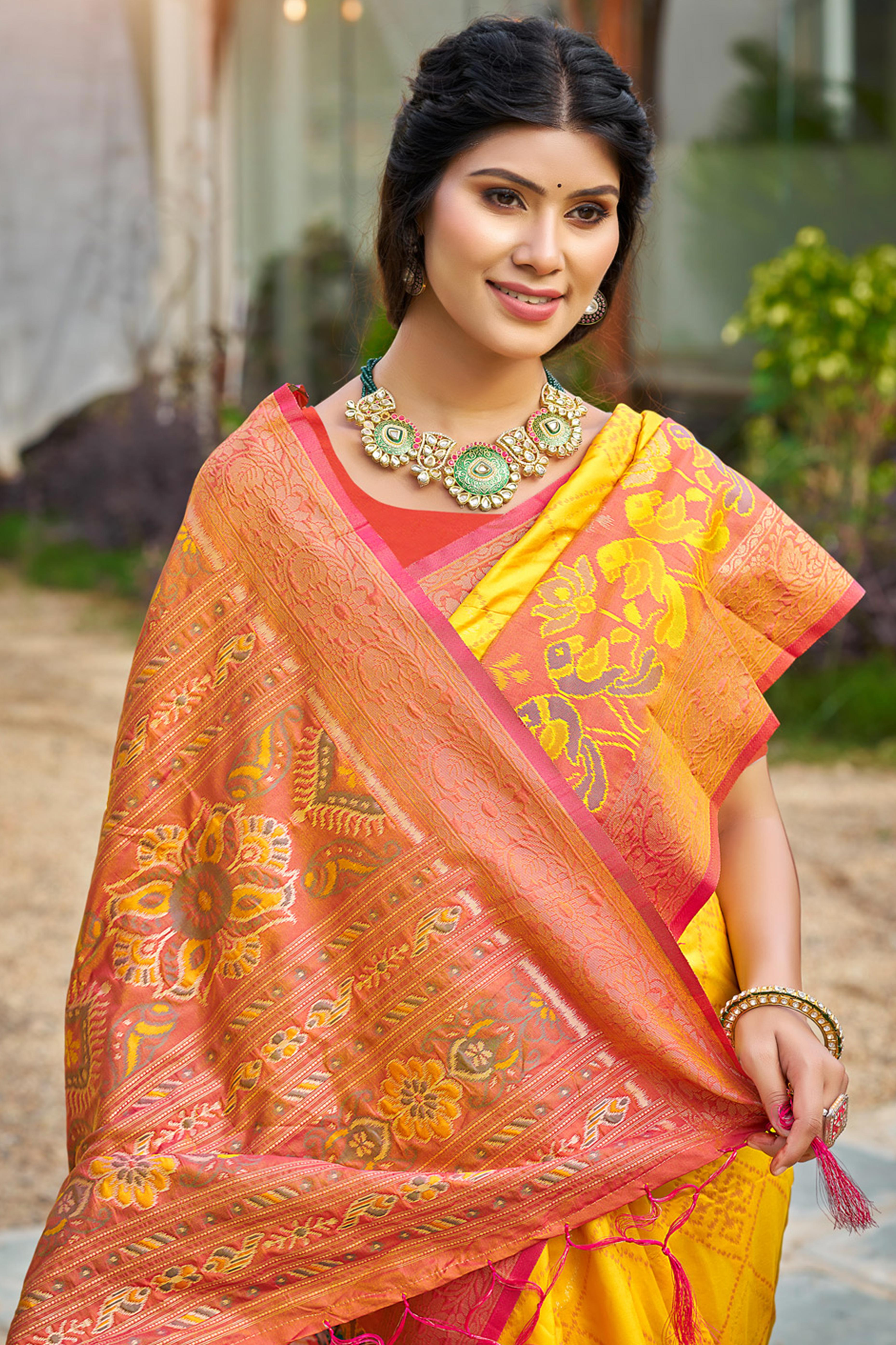 Graceful Yellow Pochampally Silk Blend Saree Adorned With Floral Weaving & Stylish Tassel Pallu