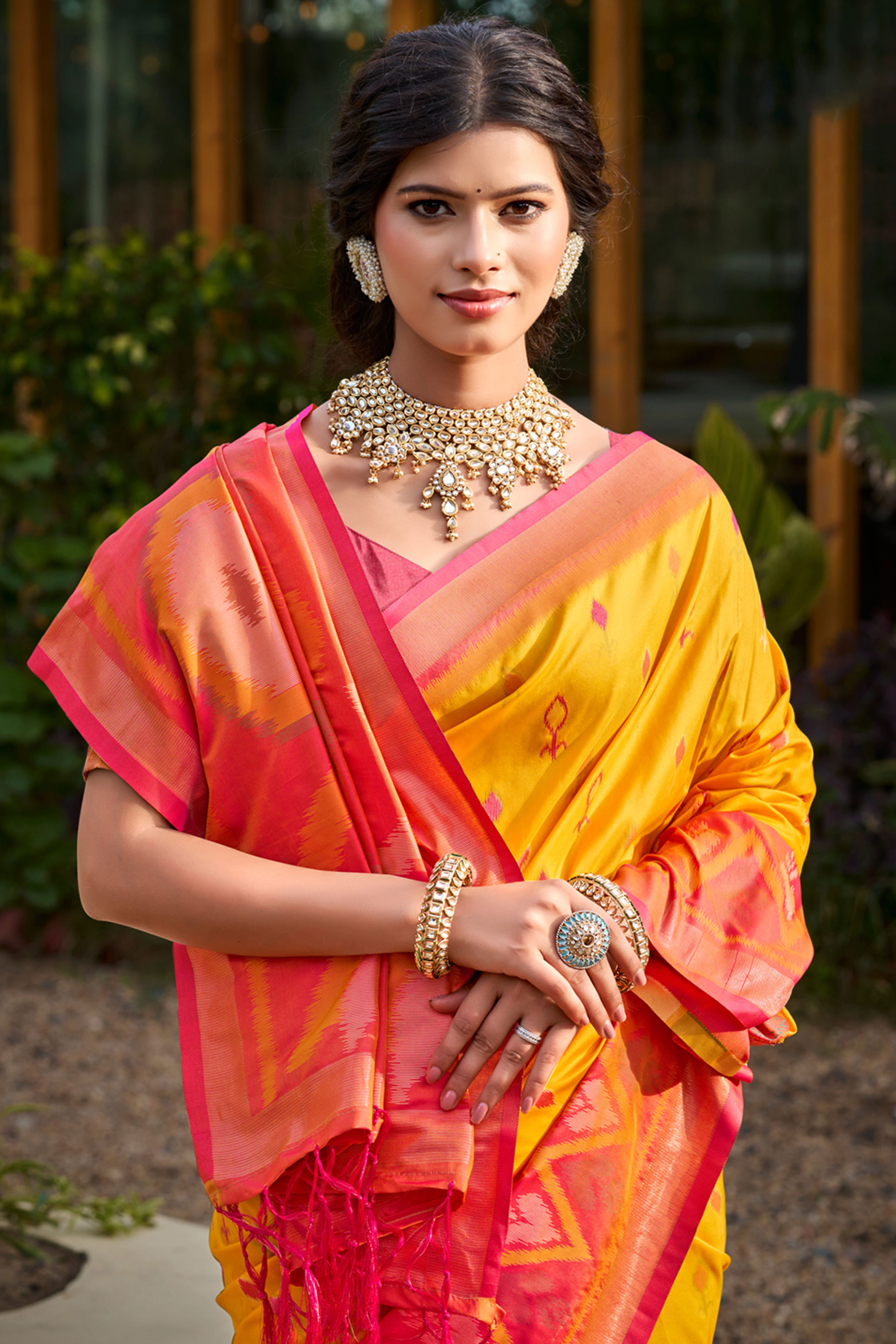 Elegant Yellow Pochampally Ikkat Silk Blend Saree Featuring Intricate Weaving & Tassel Pallu