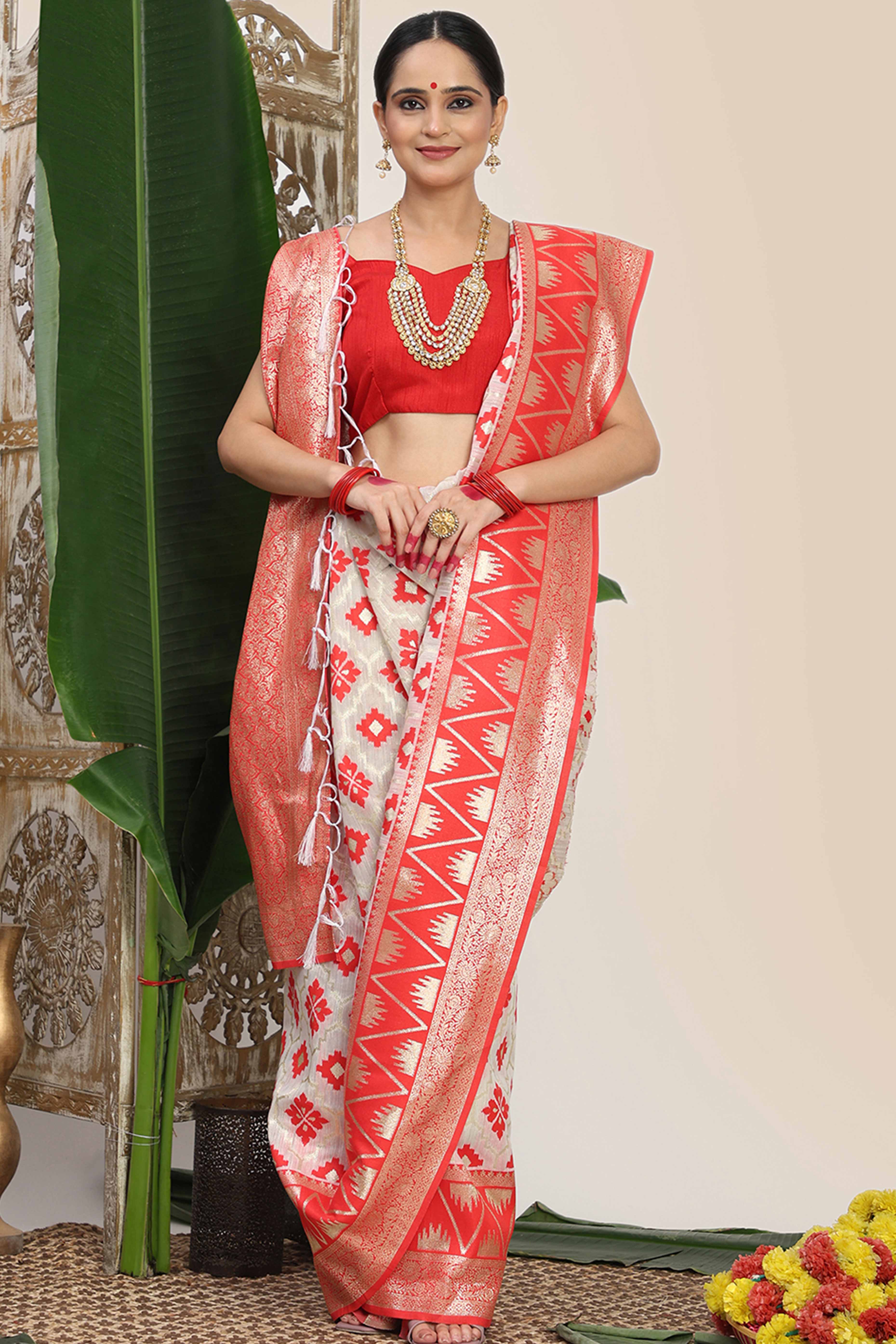 Vibrant White & Red Linen Cotton Saree Featuring Timeless Zari Weaving And Elegant Tassel Pallu