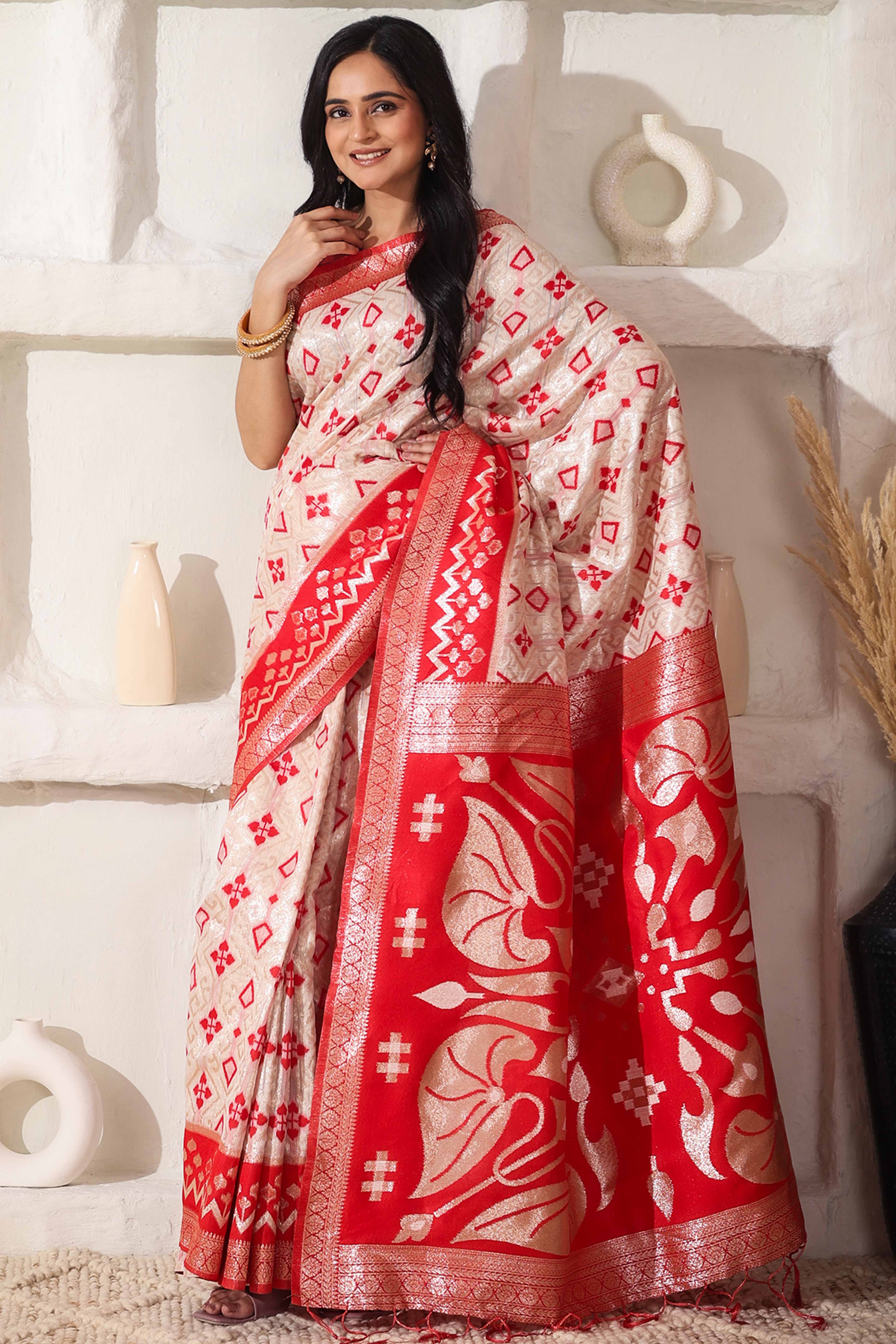 Graceful White & Red Saree In Linen Cotton With Fine Zari Weaving And Flowing Tassel Details