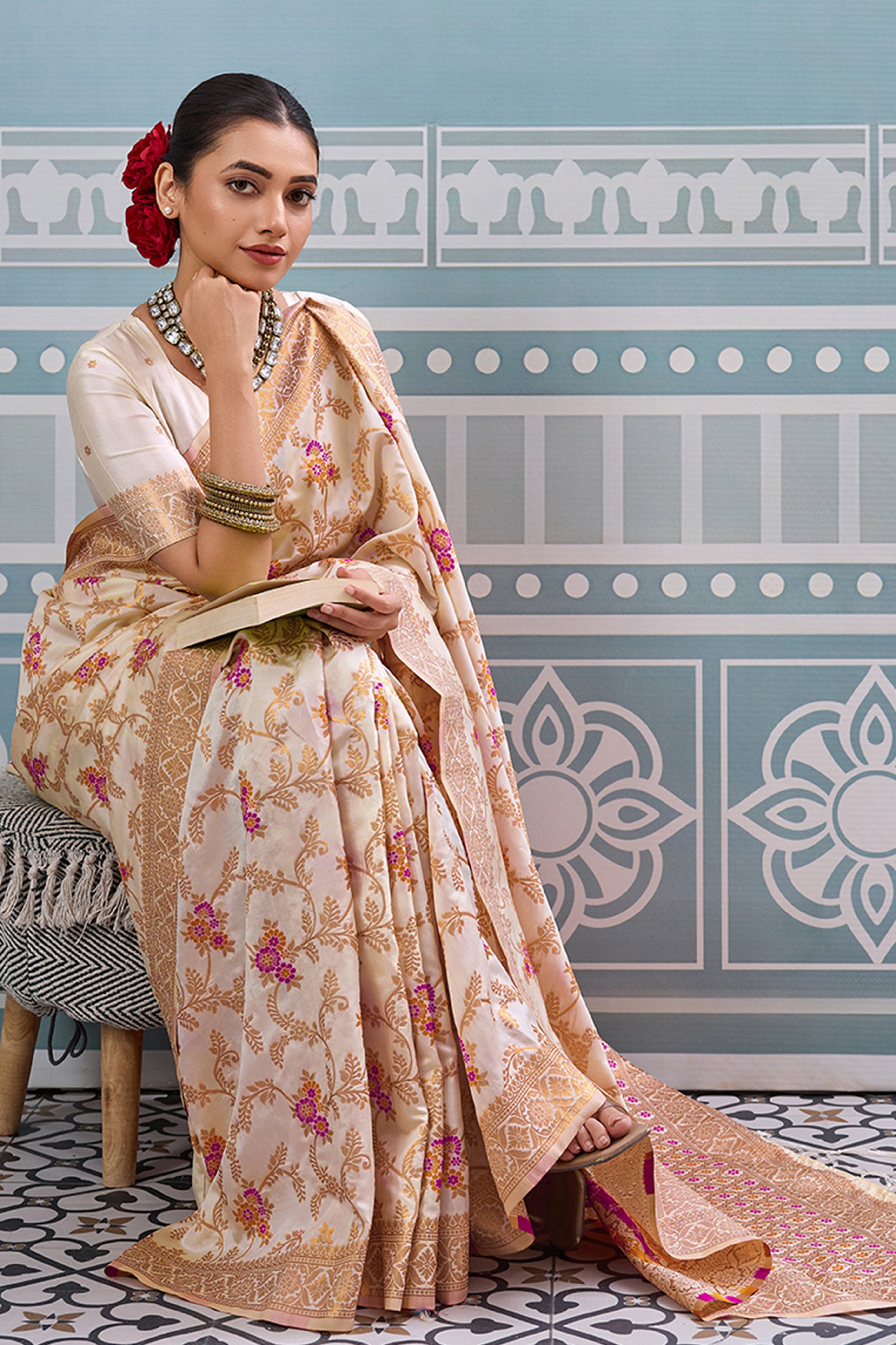 Majestic Bloom Cream Floral Zari Weaving Silk Blend Saree With Elegant Tassel Pallu