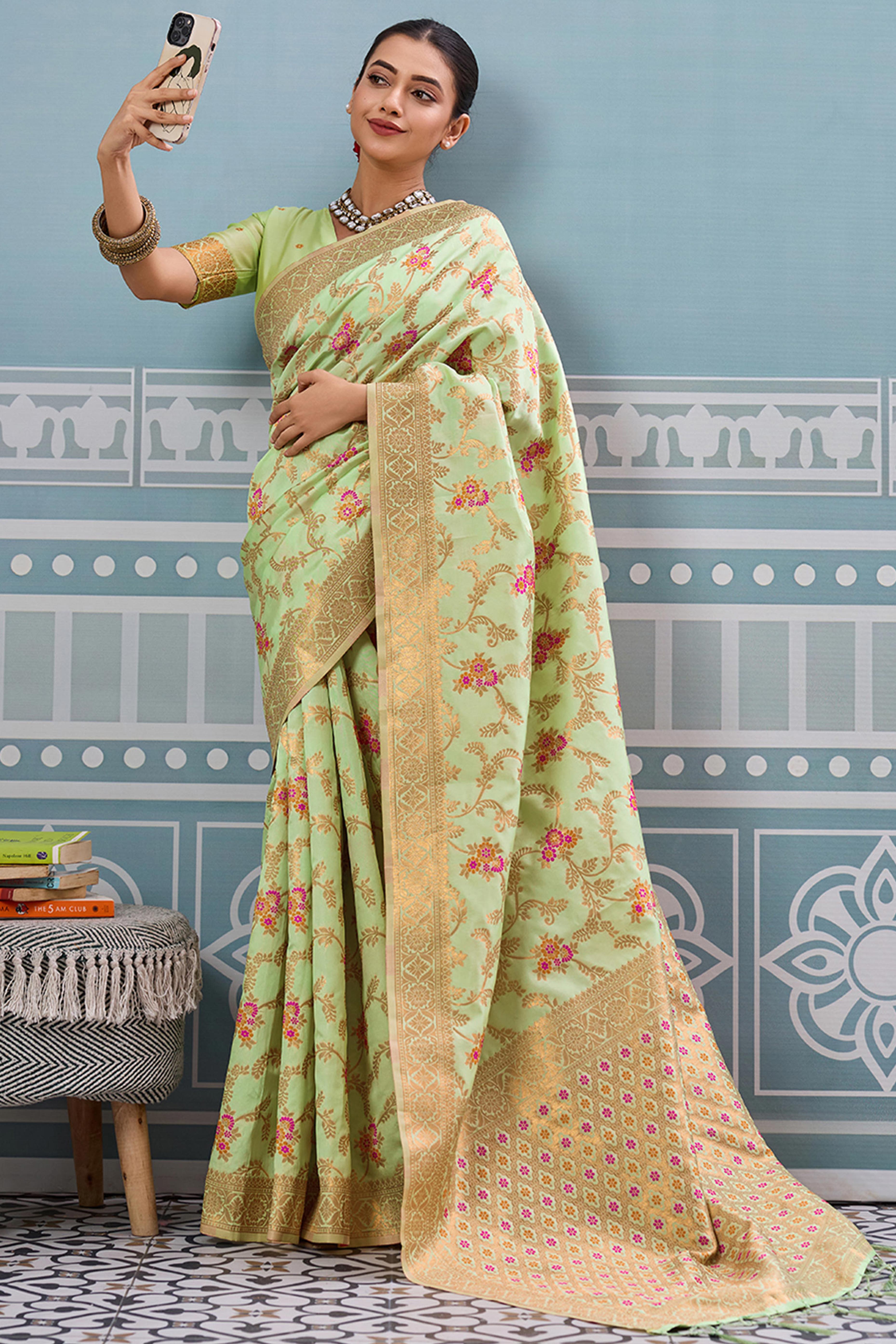 Majestic Bloom Pista Green Floral Zari Weaving Silk Blend Saree With Elegant Tassel Pallu