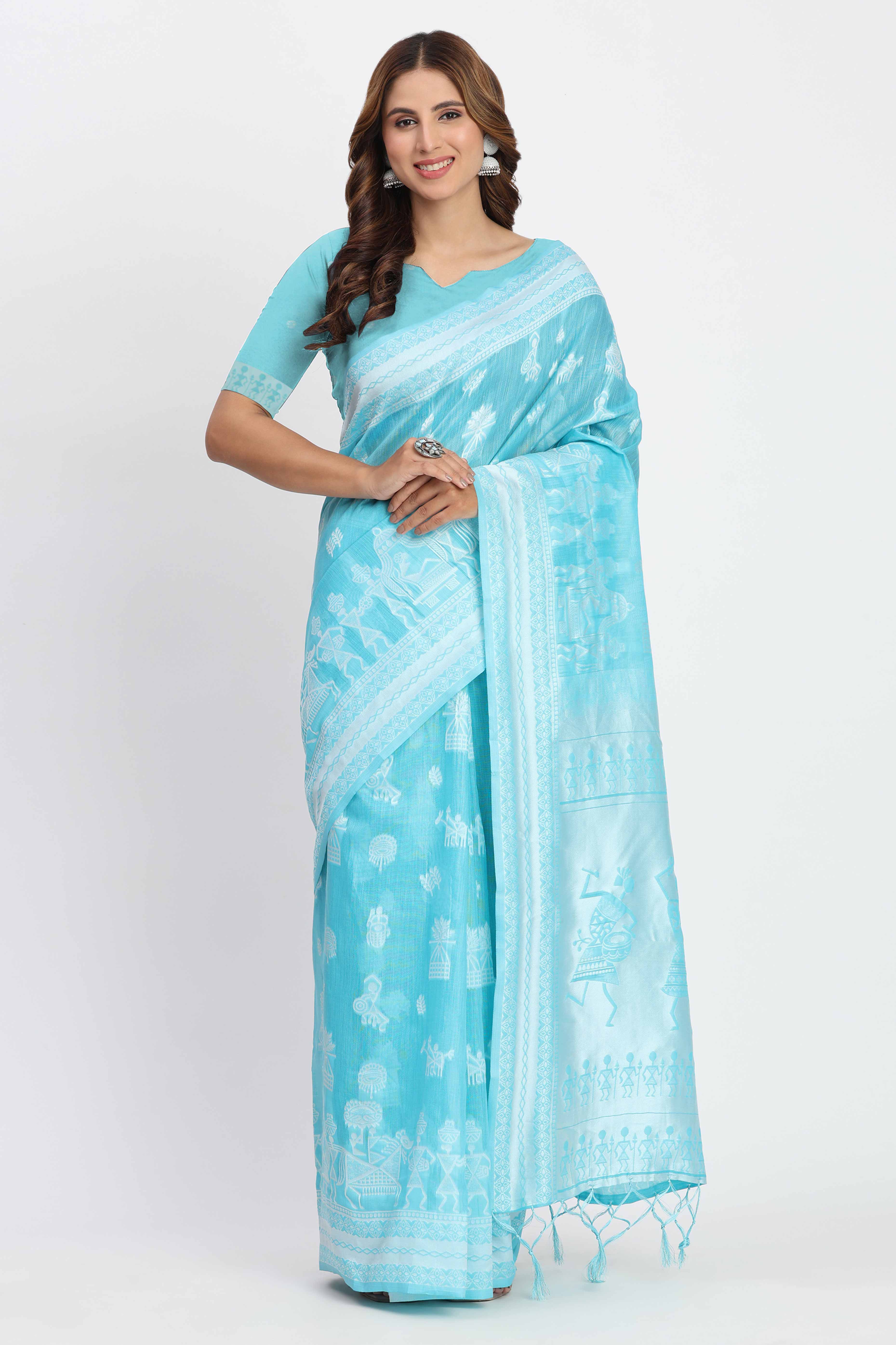 Blue Linen Cotton Saree Showcasing Traditional Warli Motifs In Zari Weaving With Tassel Pallu