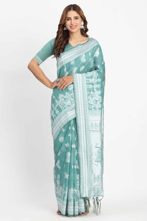 Pastel Sea Green Linen Cotton Saree Showcasing Warli Motifs In Zari Weaving With Tassel Pallu