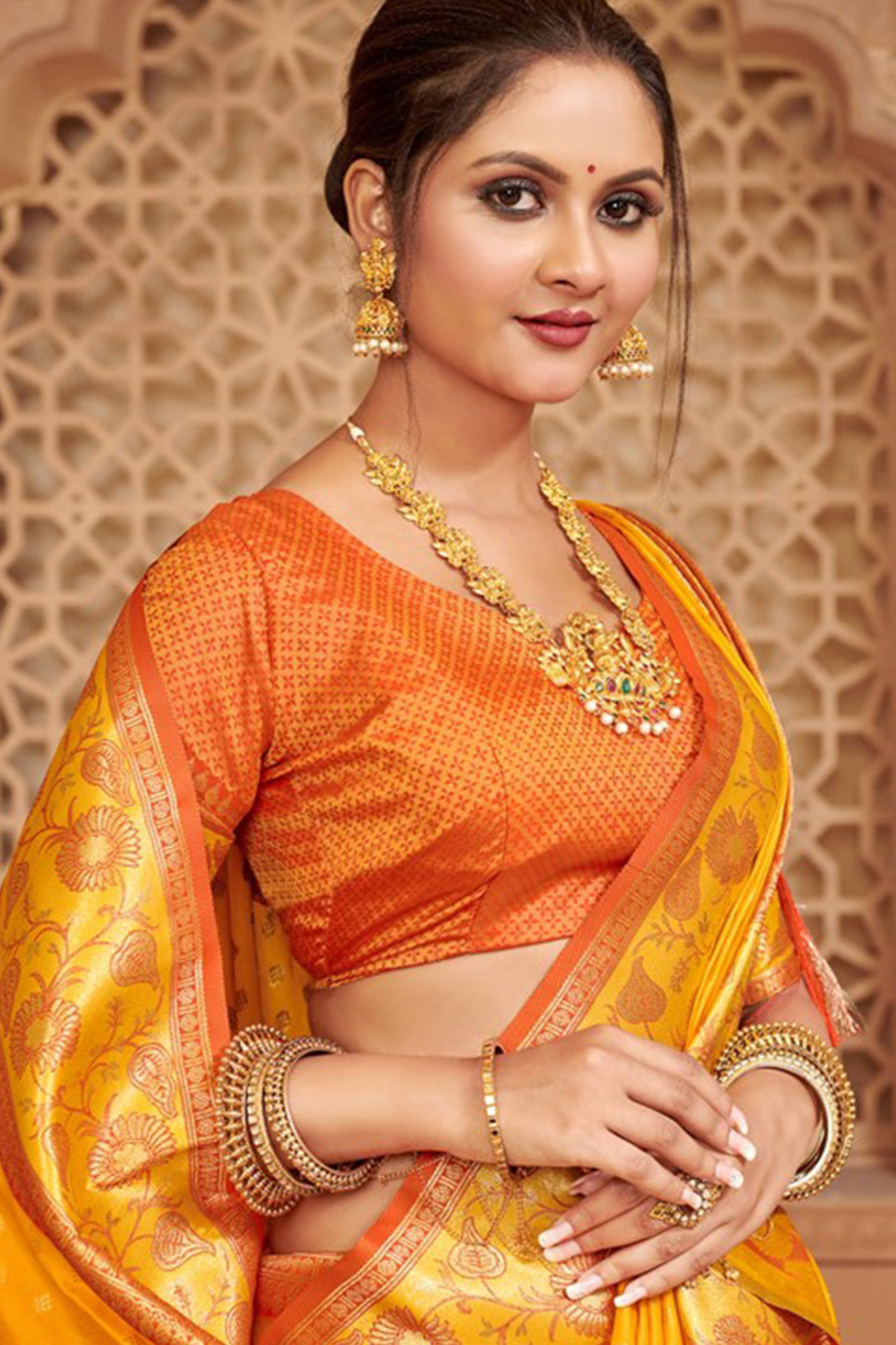 Elegant Yellow Floral Zari Weaving Silk Blend Saree With Tassel Pallu