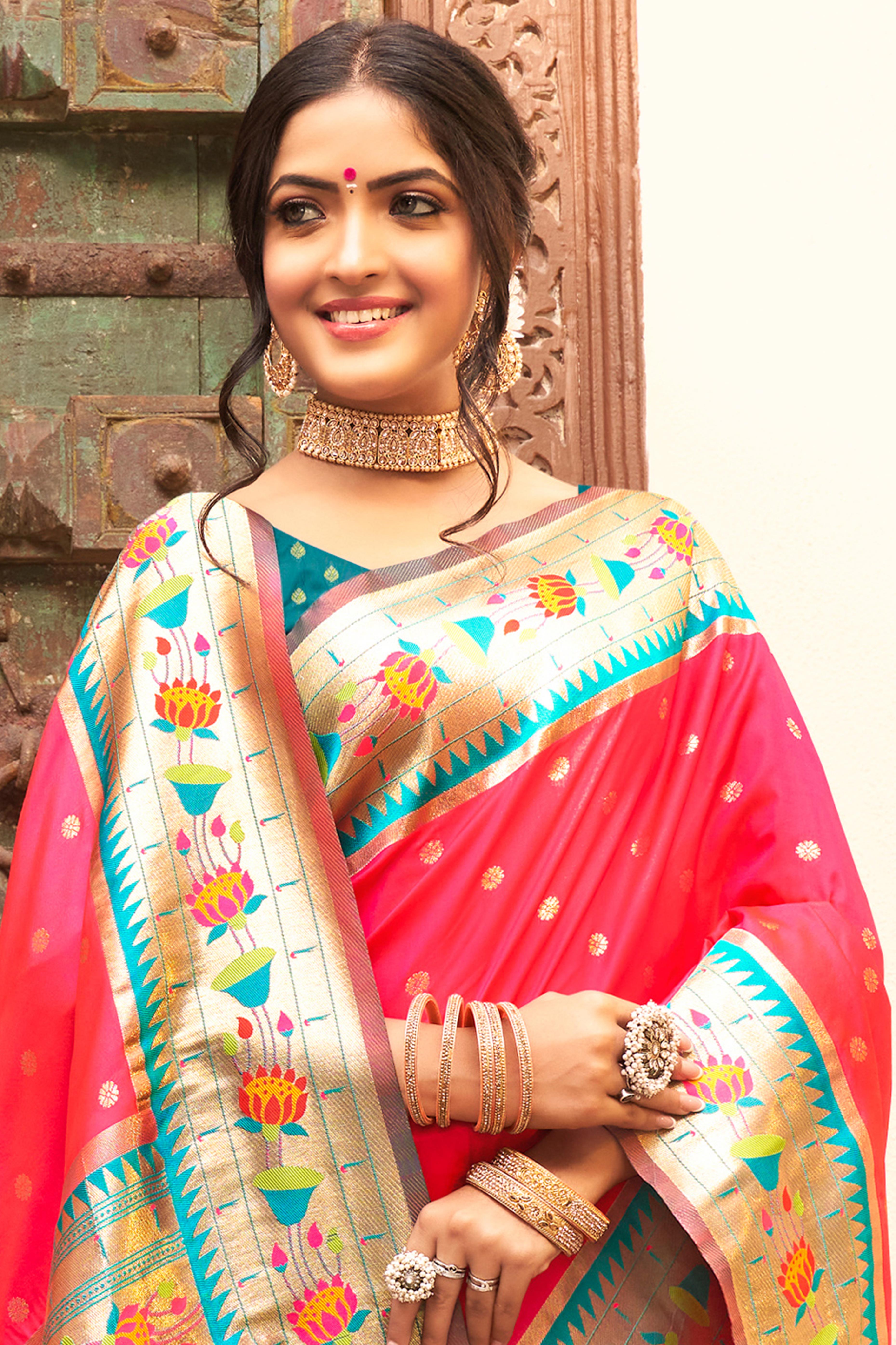 Charming Pink Floral Zari Woven Silk Blend Saree With Stylish Tassel Pallu