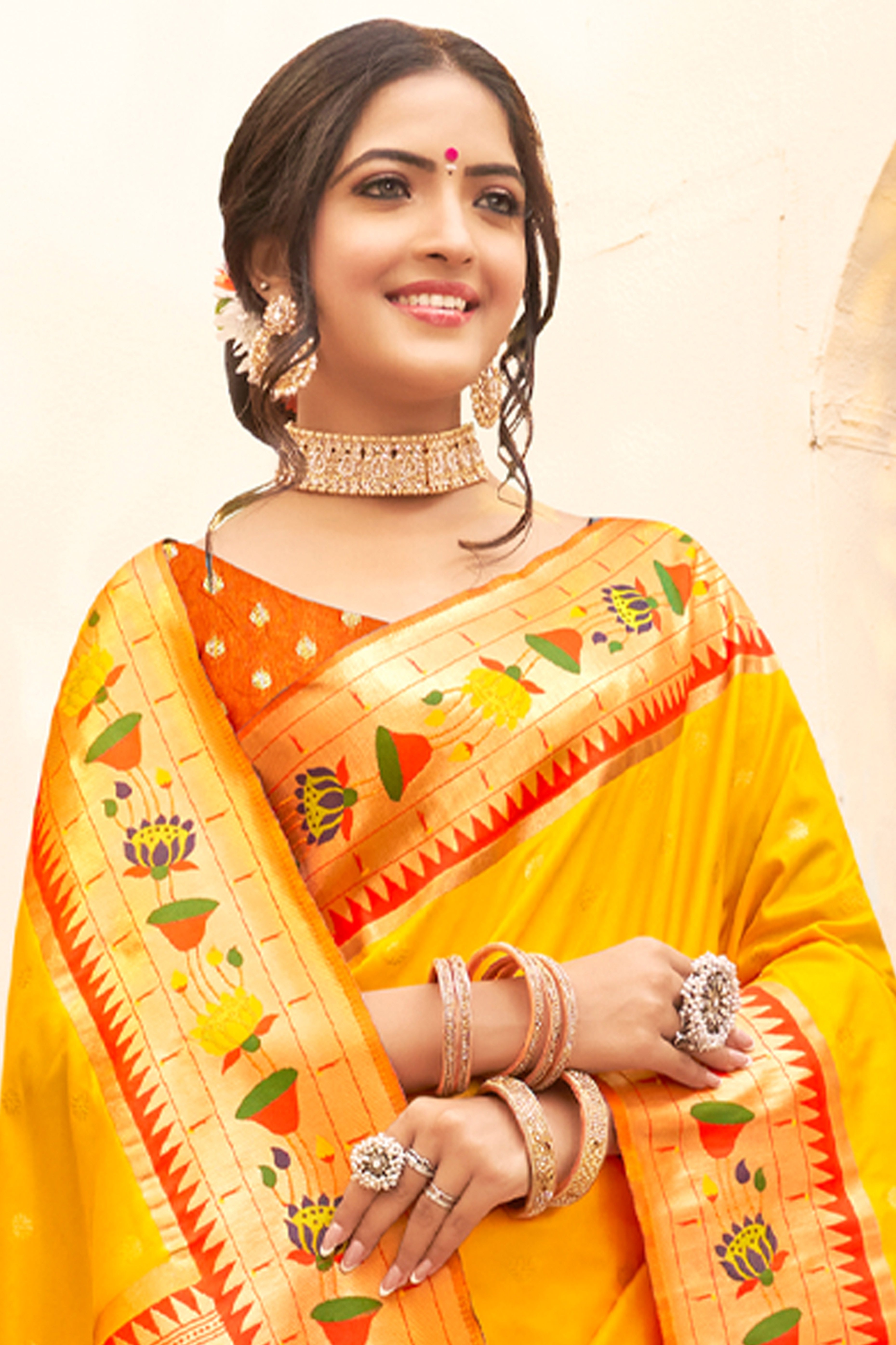 Charming Yellow Floral Zari Woven Silk Blend Saree With Stylish Tassel Pallu