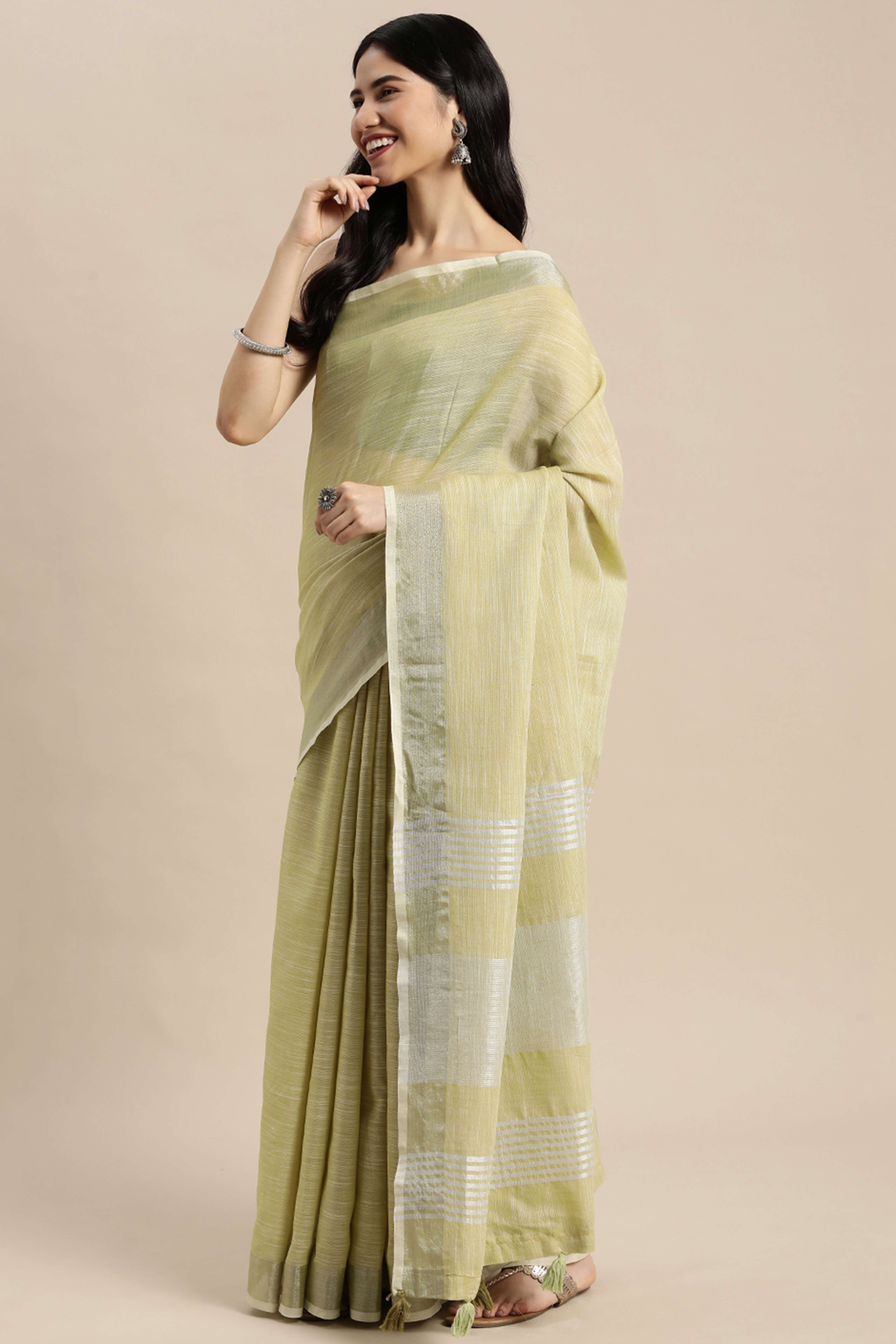 Olive Green Linen Saree Adorned With Silver Zari Weaving Border & Pallu