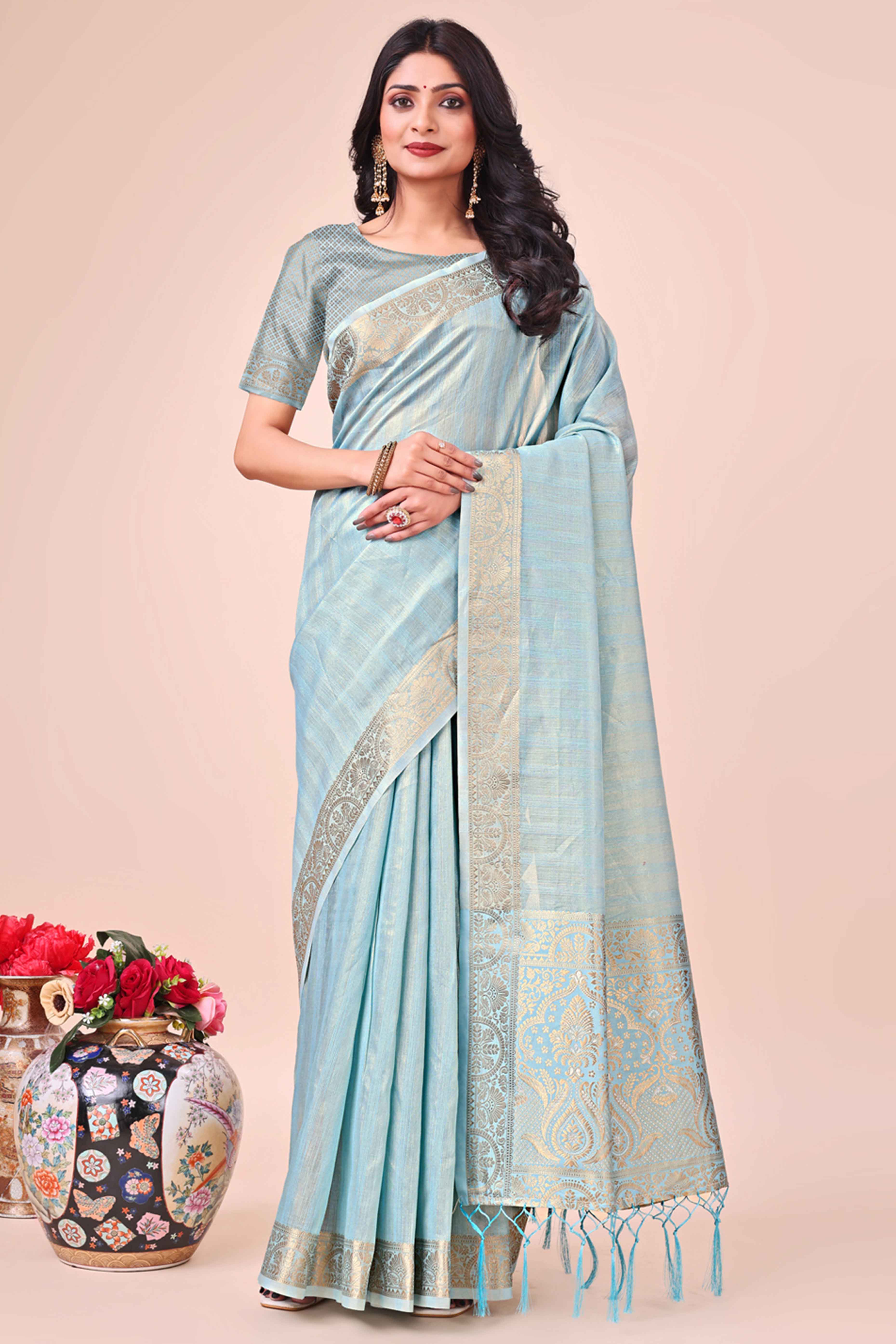 Sky Blue Organza Saree With Floral Zari Weave & Tassel Accents