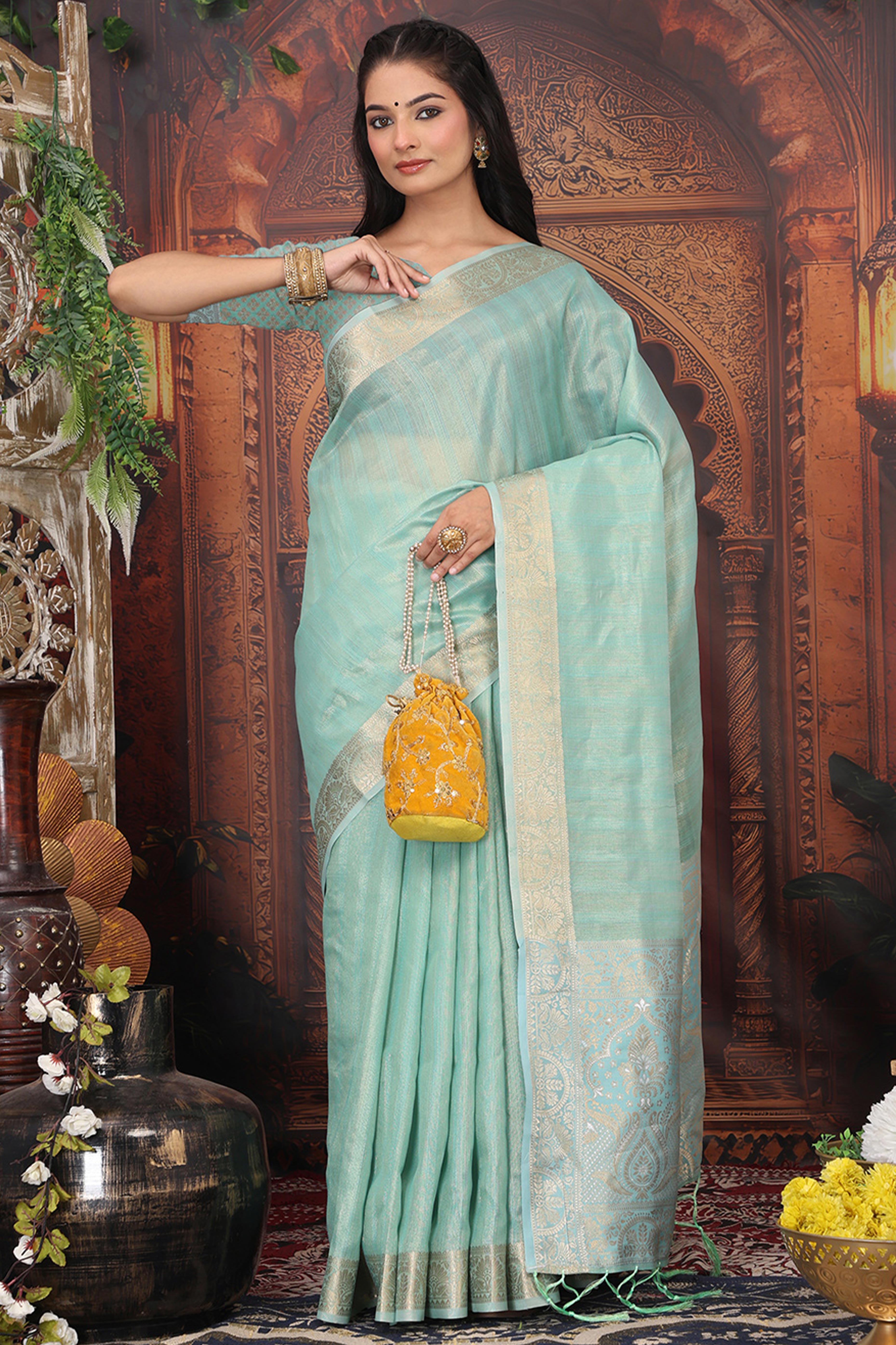 Turquoise Organza Saree Adorned With Floral Zari Weaving & Graceful Tassel Pallu