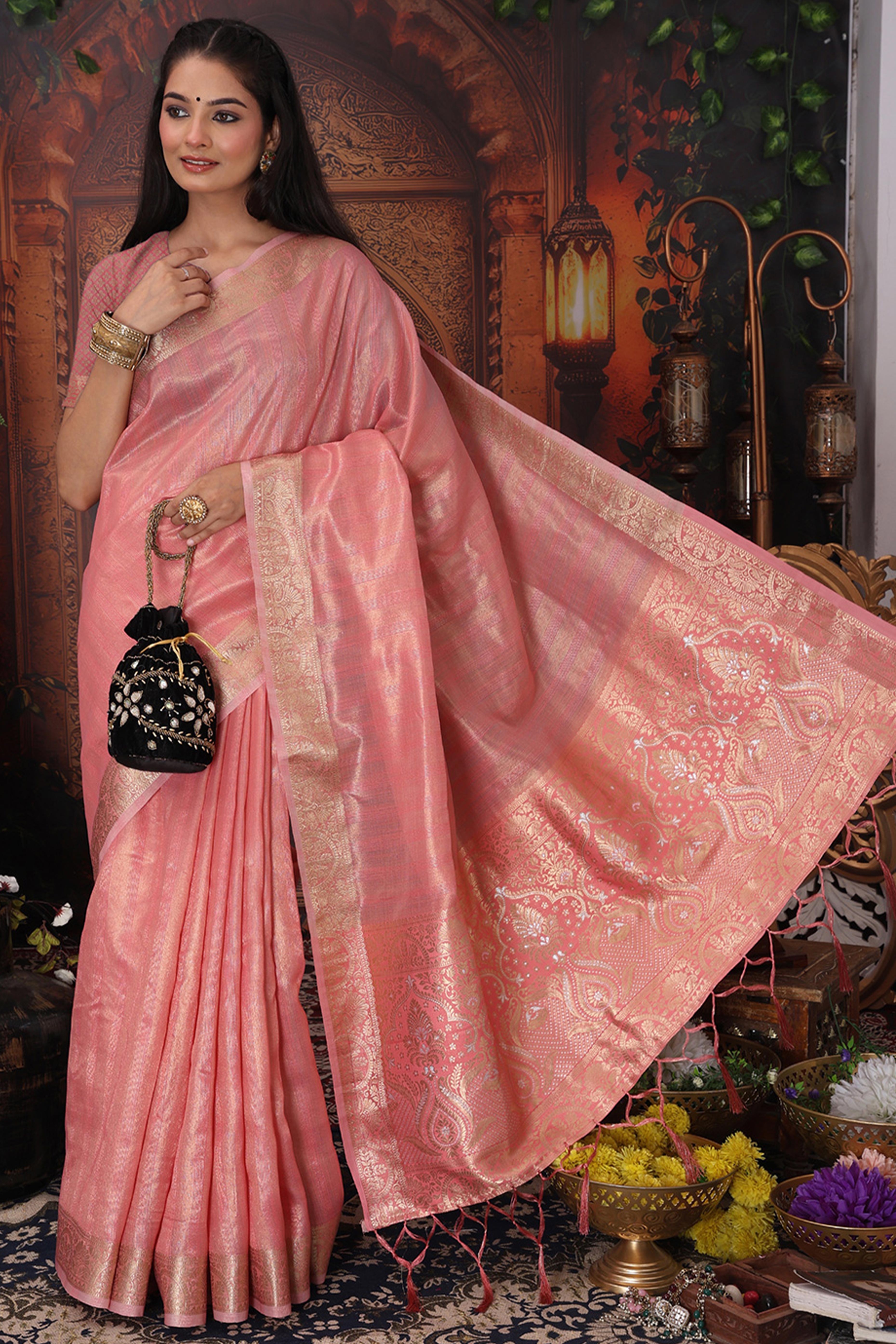 Blush Pink Organza Saree Adorned With Floral Zari Weaving & Graceful Tassel Pallu