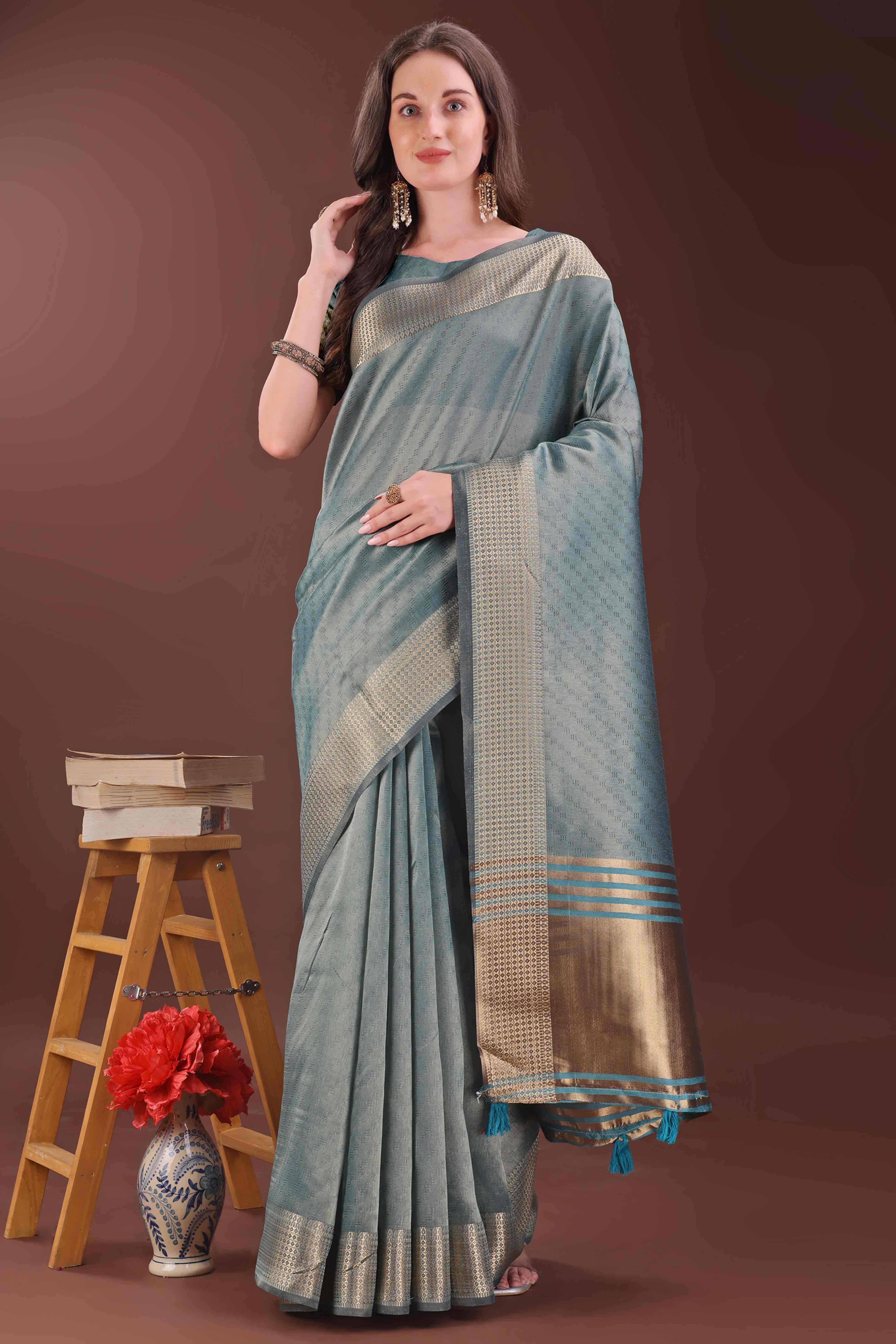 Peacock Blue Zari Weaving Organza Saree With Tassel Border
