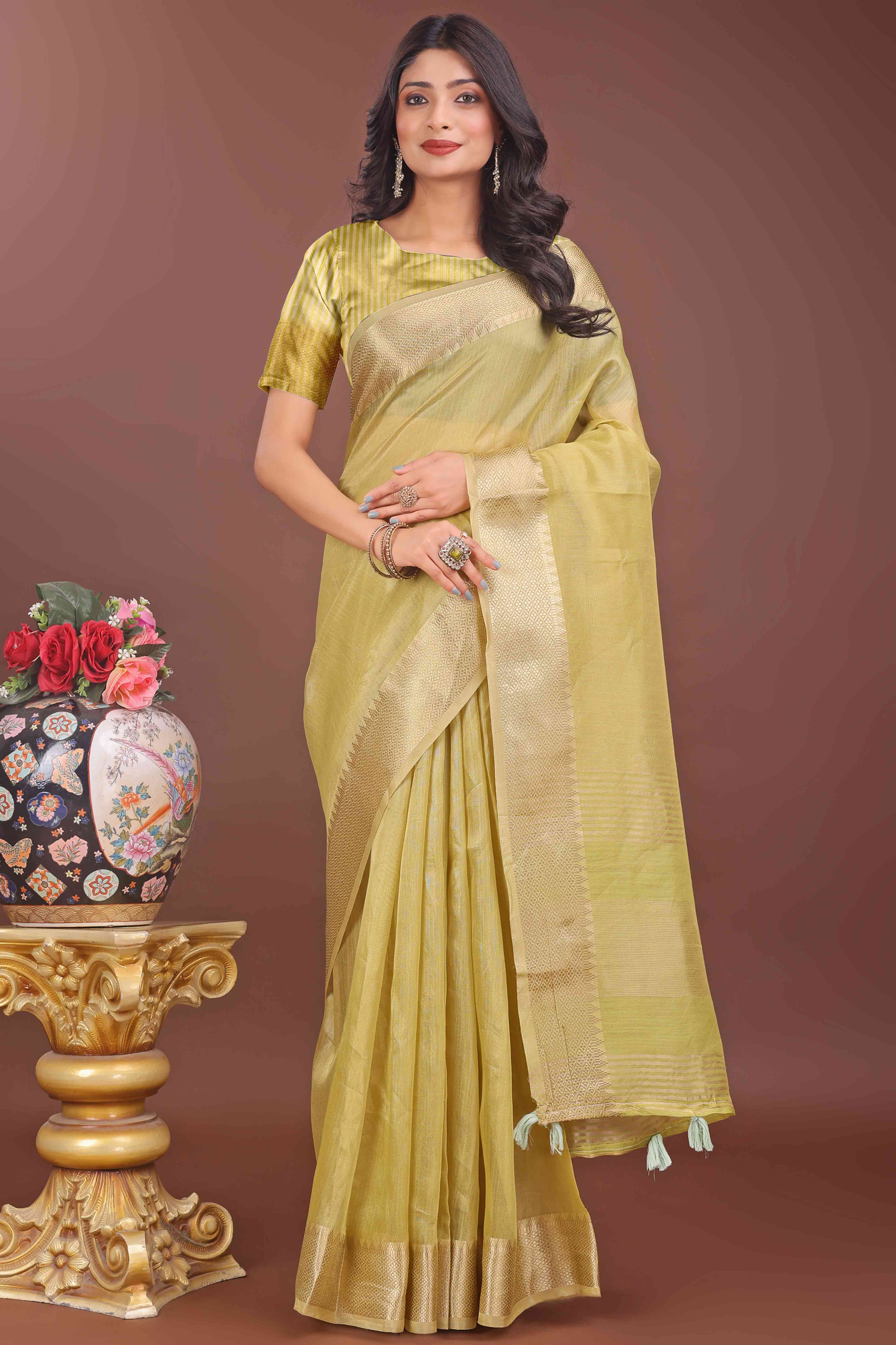 Green Solid With Zari Woven Organza Saree With Tassel Border