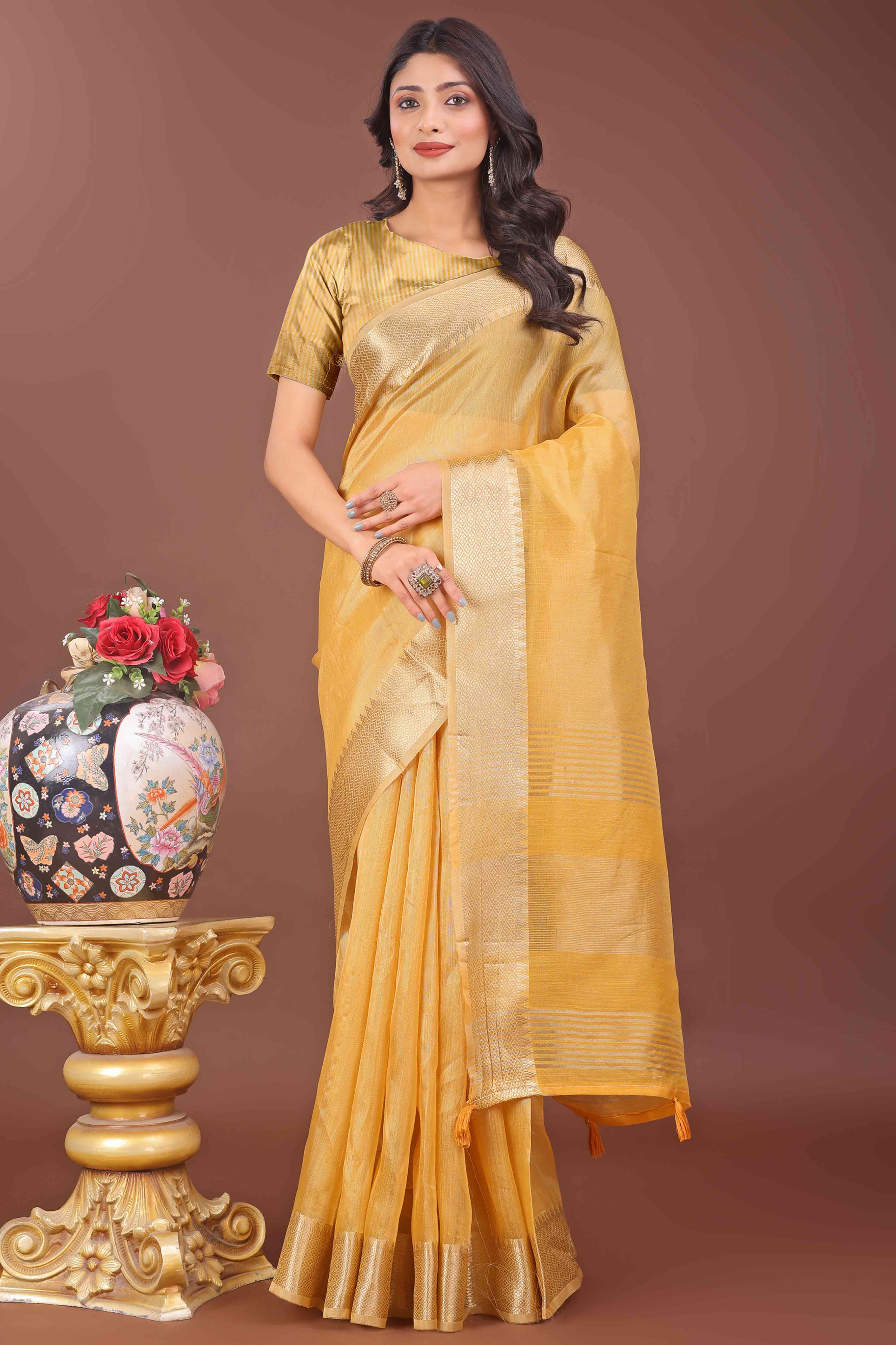 Yellow Solid With Zari Woven Organza Saree With Tassel Border