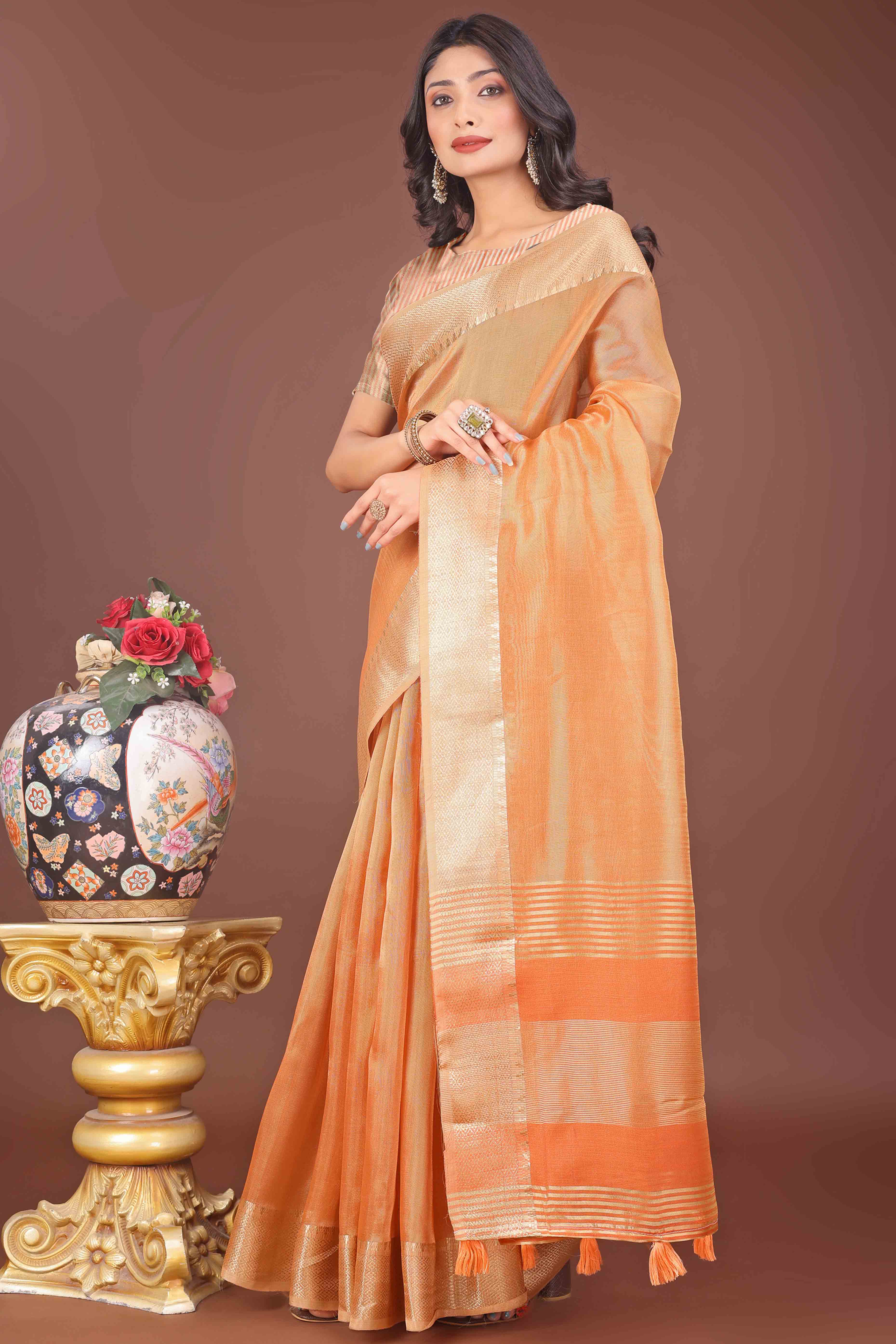 Orange Solid With Zari Woven Organza Saree With Tassel Border