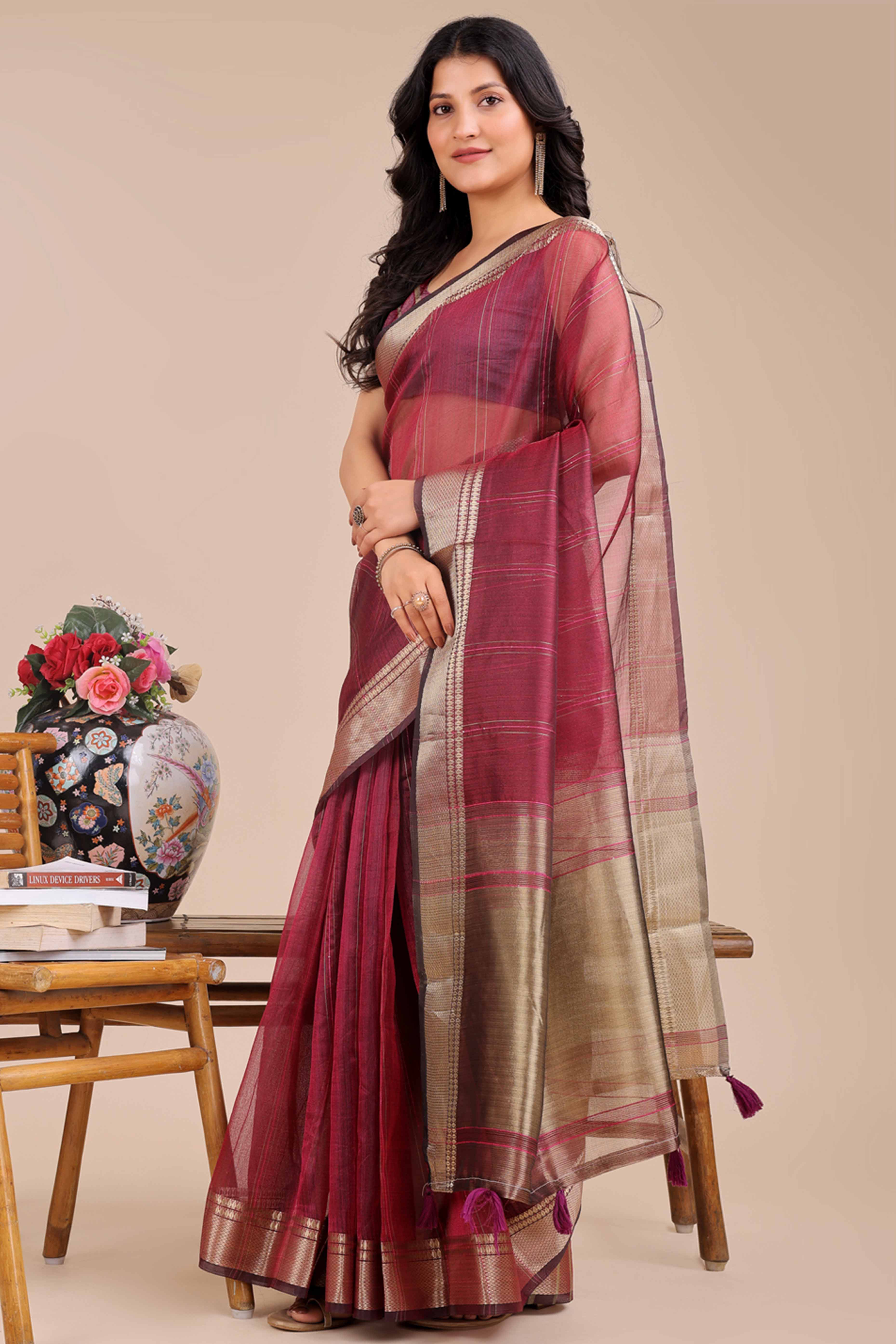 Magenta Hue Organza Saree with Shimmering Zari Border Weave