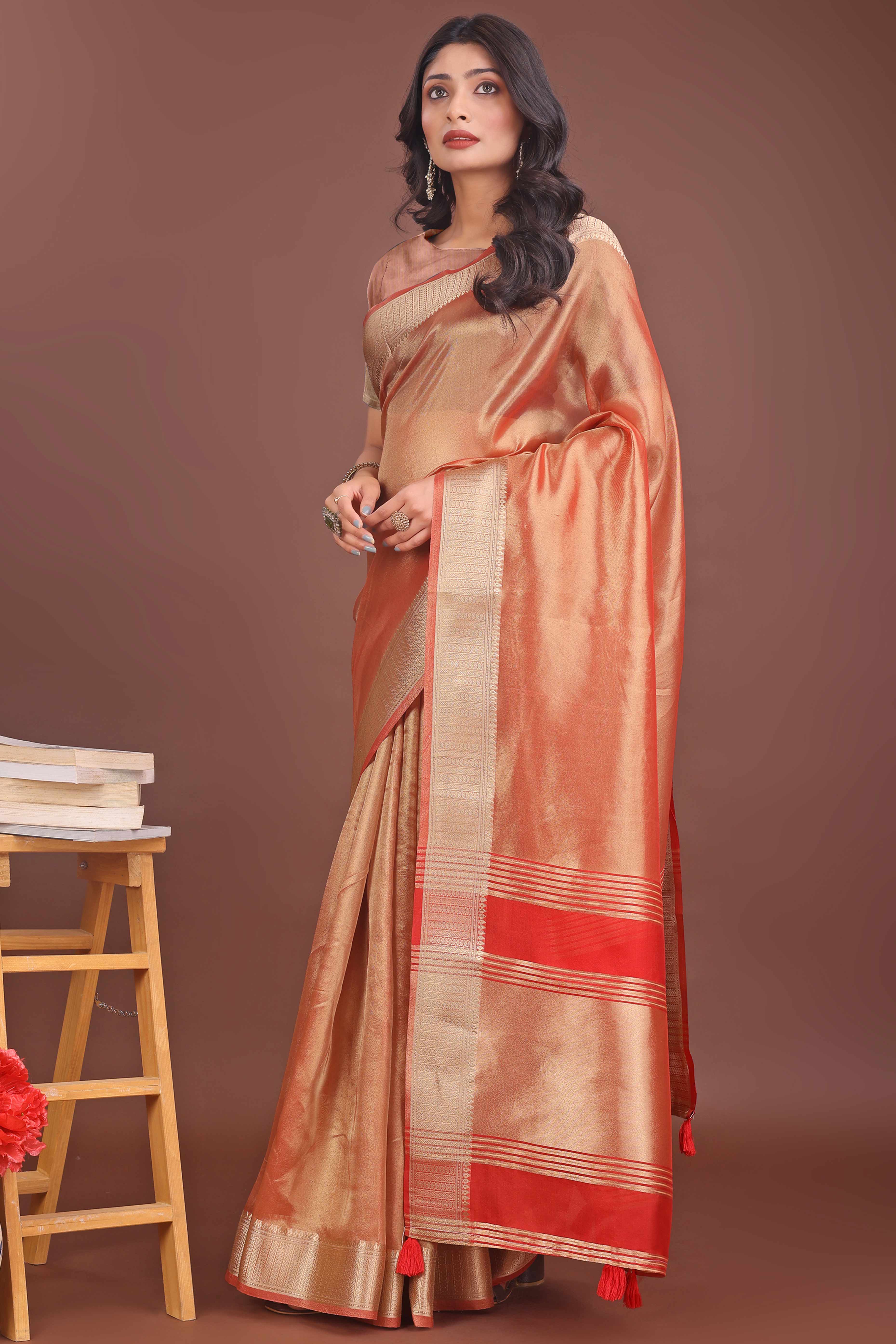 Light Orange Organza Solid Saree With Lustrous Zari Weave &  Delicate Tassels
