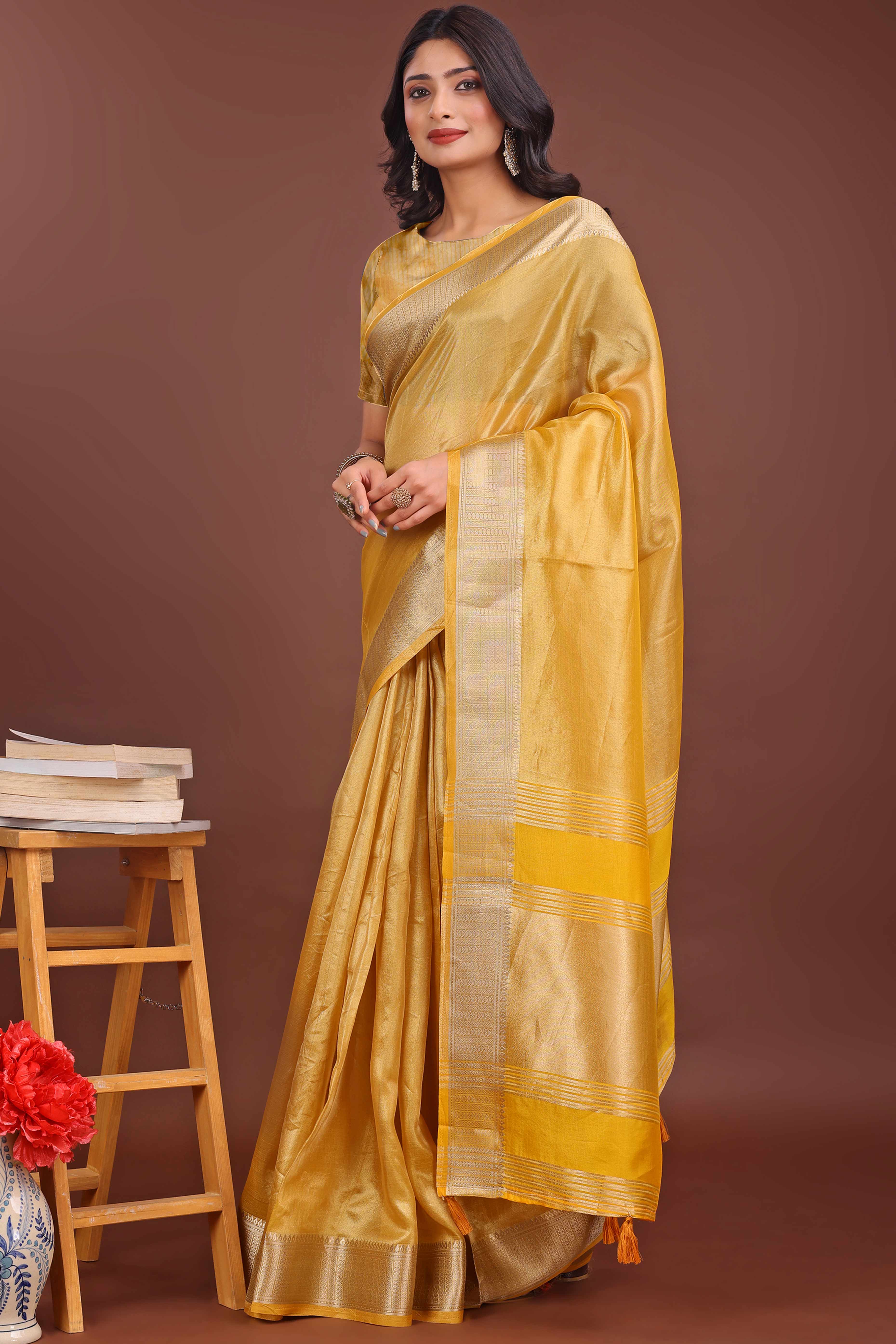 Yellow Organza Solid Saree With Lustrous Zari Weave &  Delicate Tassels