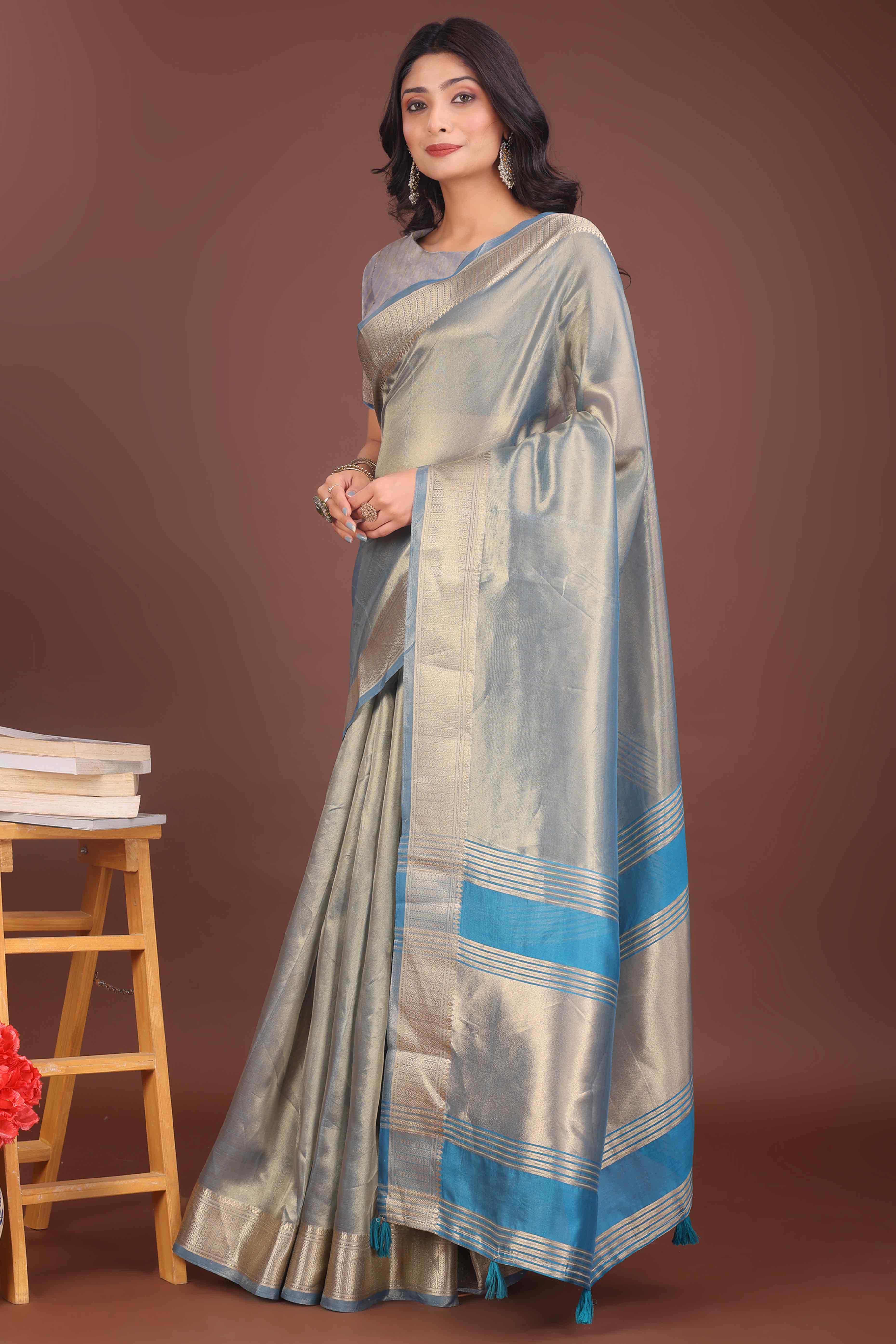 Greyish Blue Organza Solid Saree With Lustrous Zari Weave &  Delicate Tassels