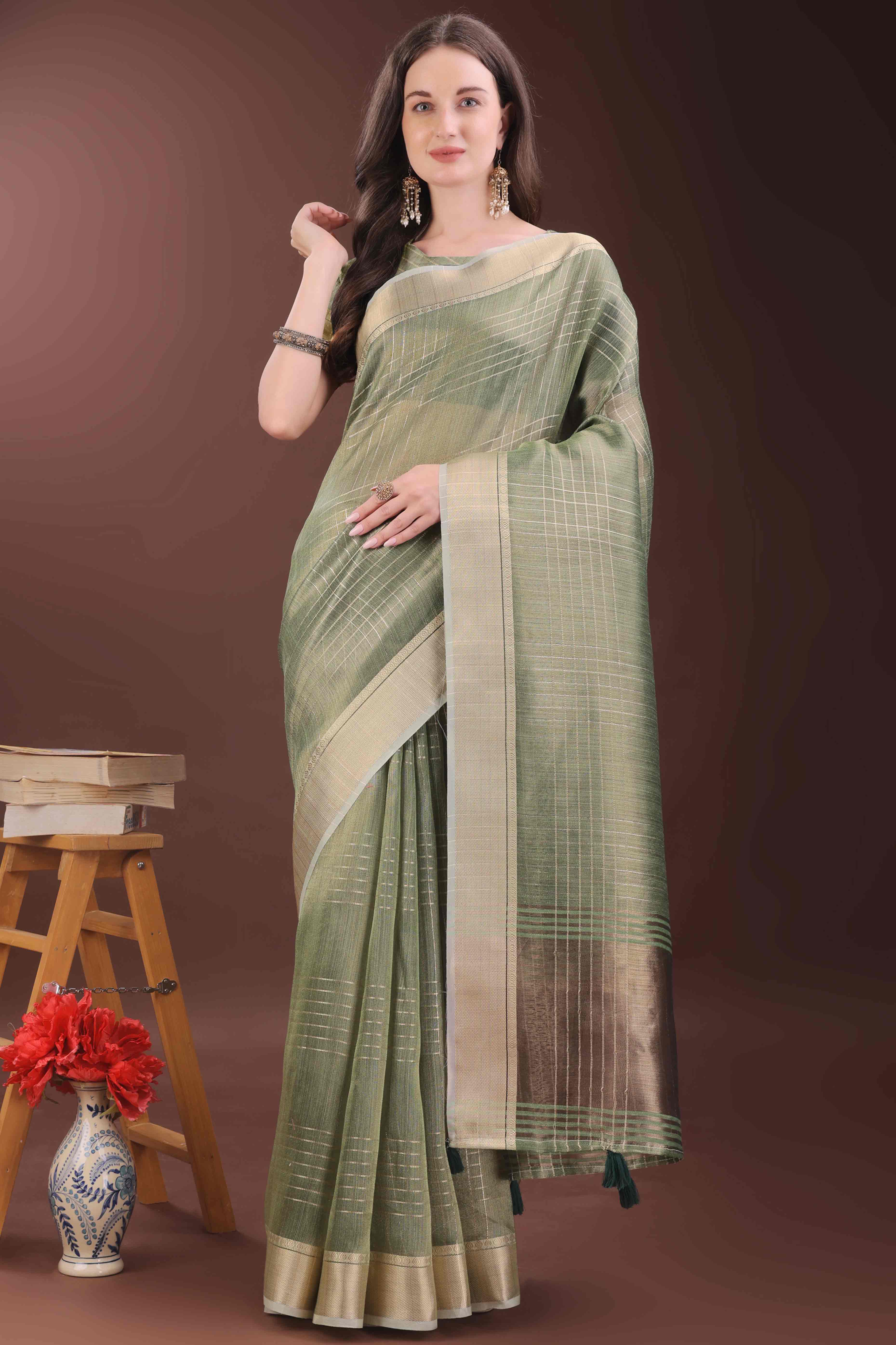 Green Organza Saree With Zari Weaving Check Patterns & Elegant Tassel Accents