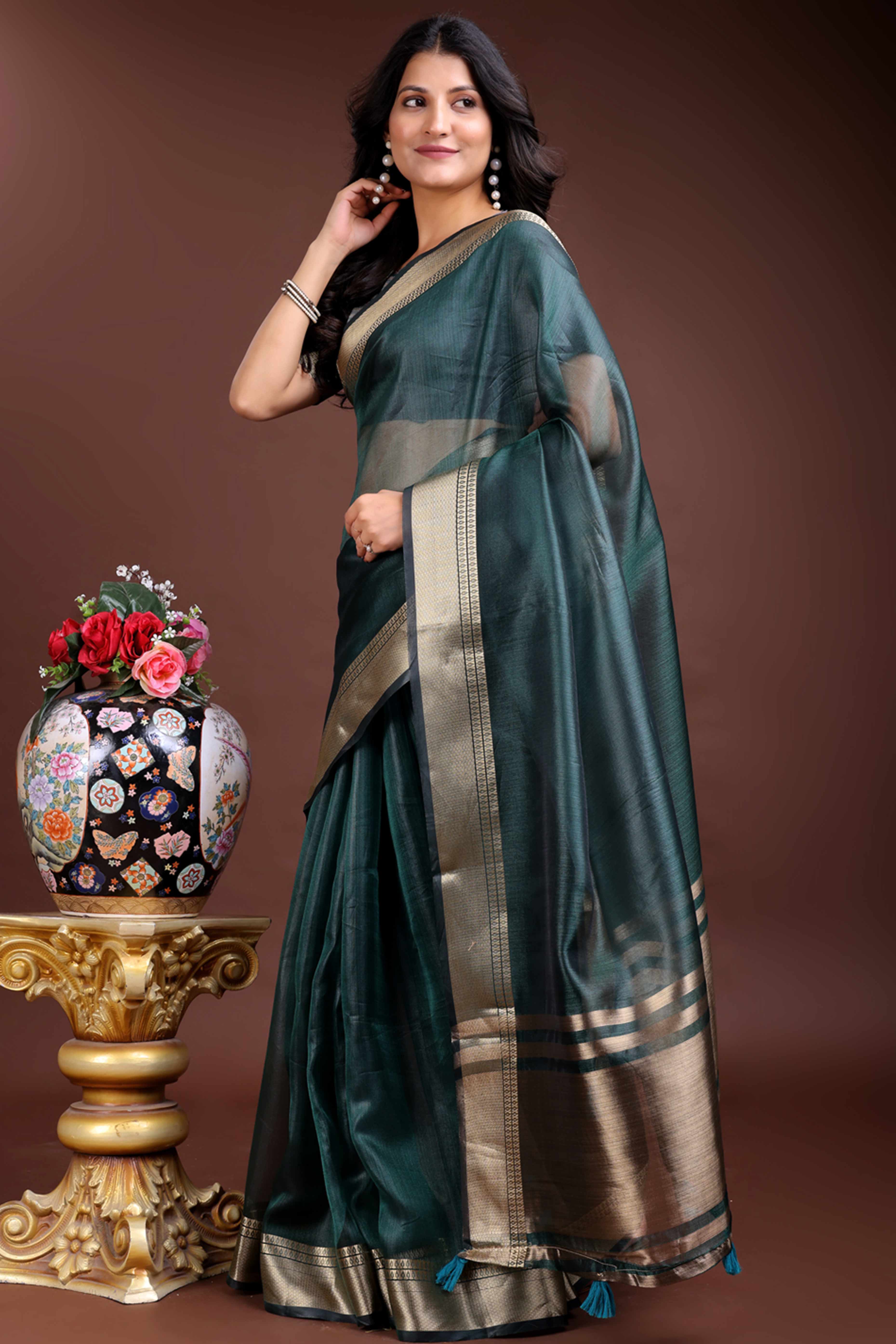 Emerald Green Organza Saree with Zari Border Weaving Charm