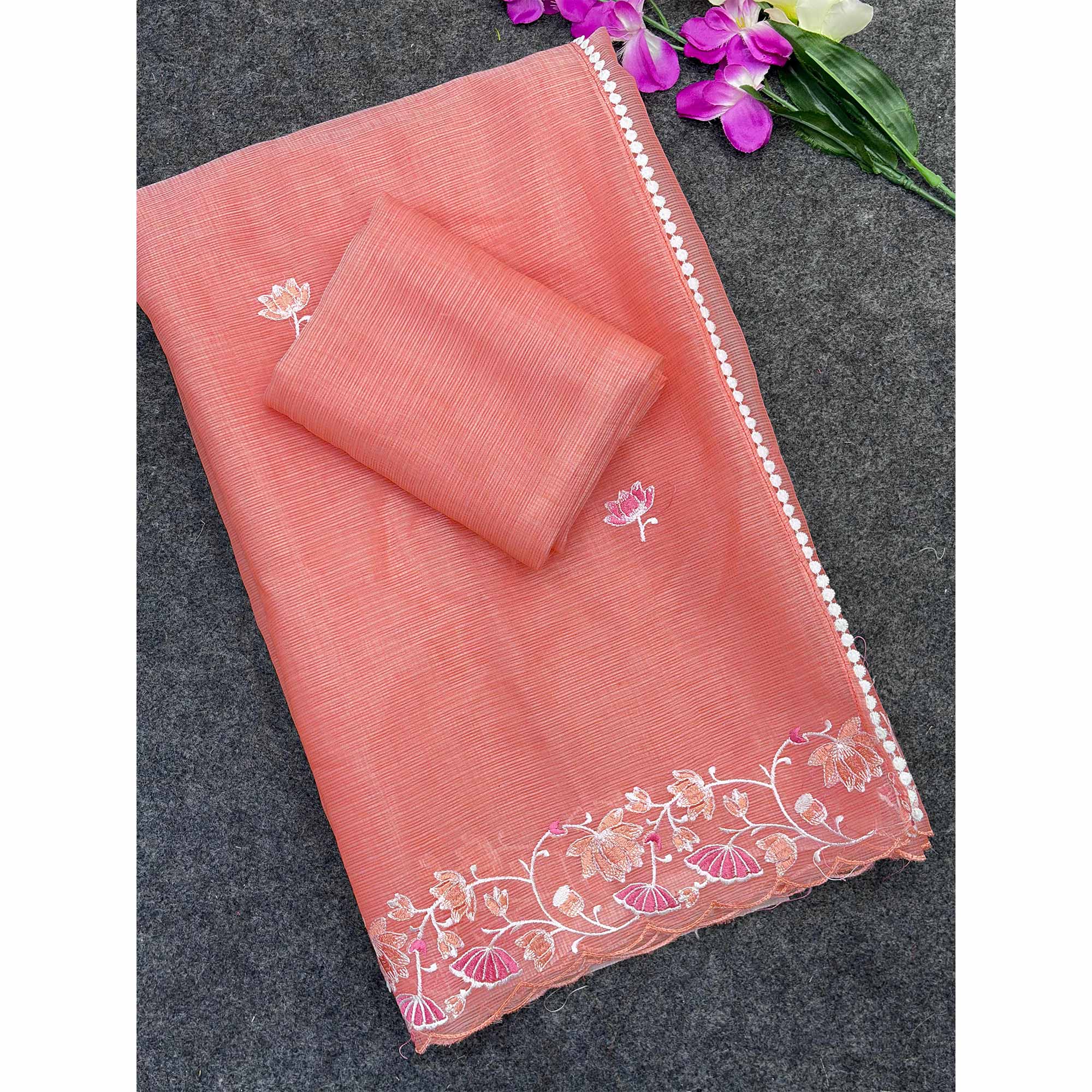 Peach Handwoven Kota Doria Saree Featuring Rich Gota Work for a Festive Look